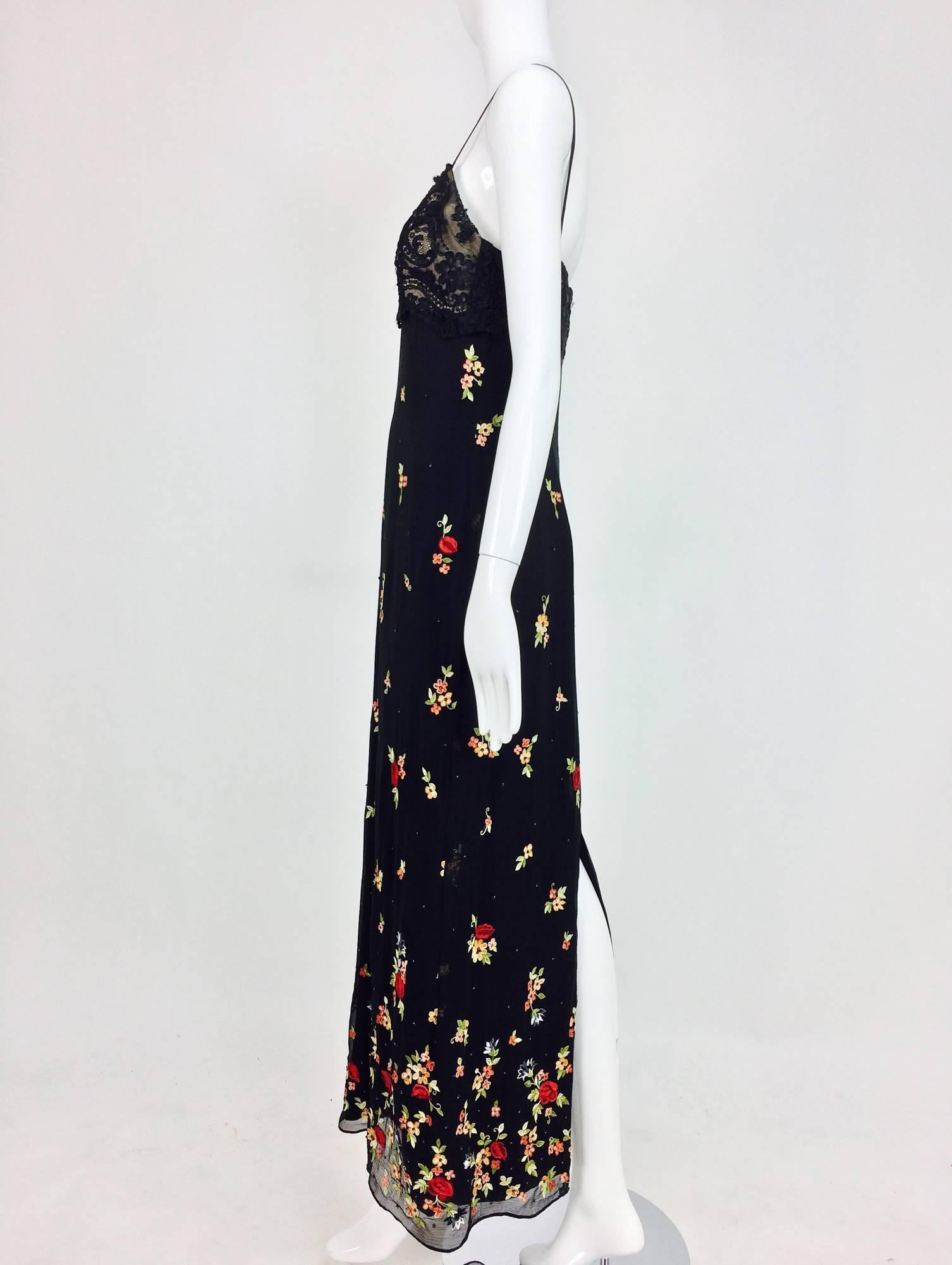 Bellville Sassoon maxi dress designed by Lorcan Mullany. Empire style dress with a black guipure lace bodice, narrow shoulder straps and a long column of beautifully floral embroidered and beaded black silk chiffon. The dress has a deep back hem