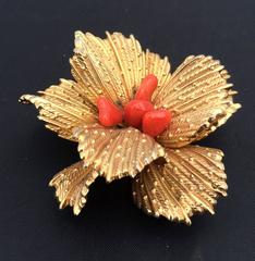 Gold floral brooch with coral center Grosse Germany 1960s