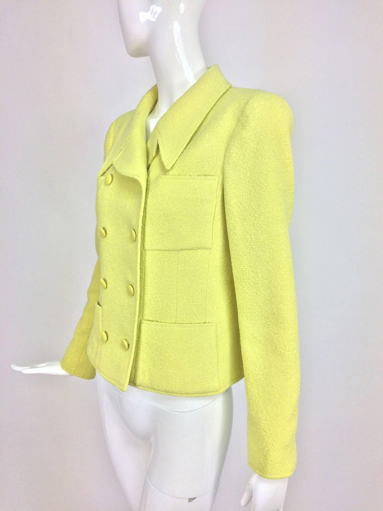 Vintage Chanel lemony yellow boucle double breasted jacket 1990s 40...Double breasted jacket with four patch pockets, notched lapel collar...Yellow Chanel logo buttons...Three buttons at each cuff...Hip bone length jacket has princess seams and is