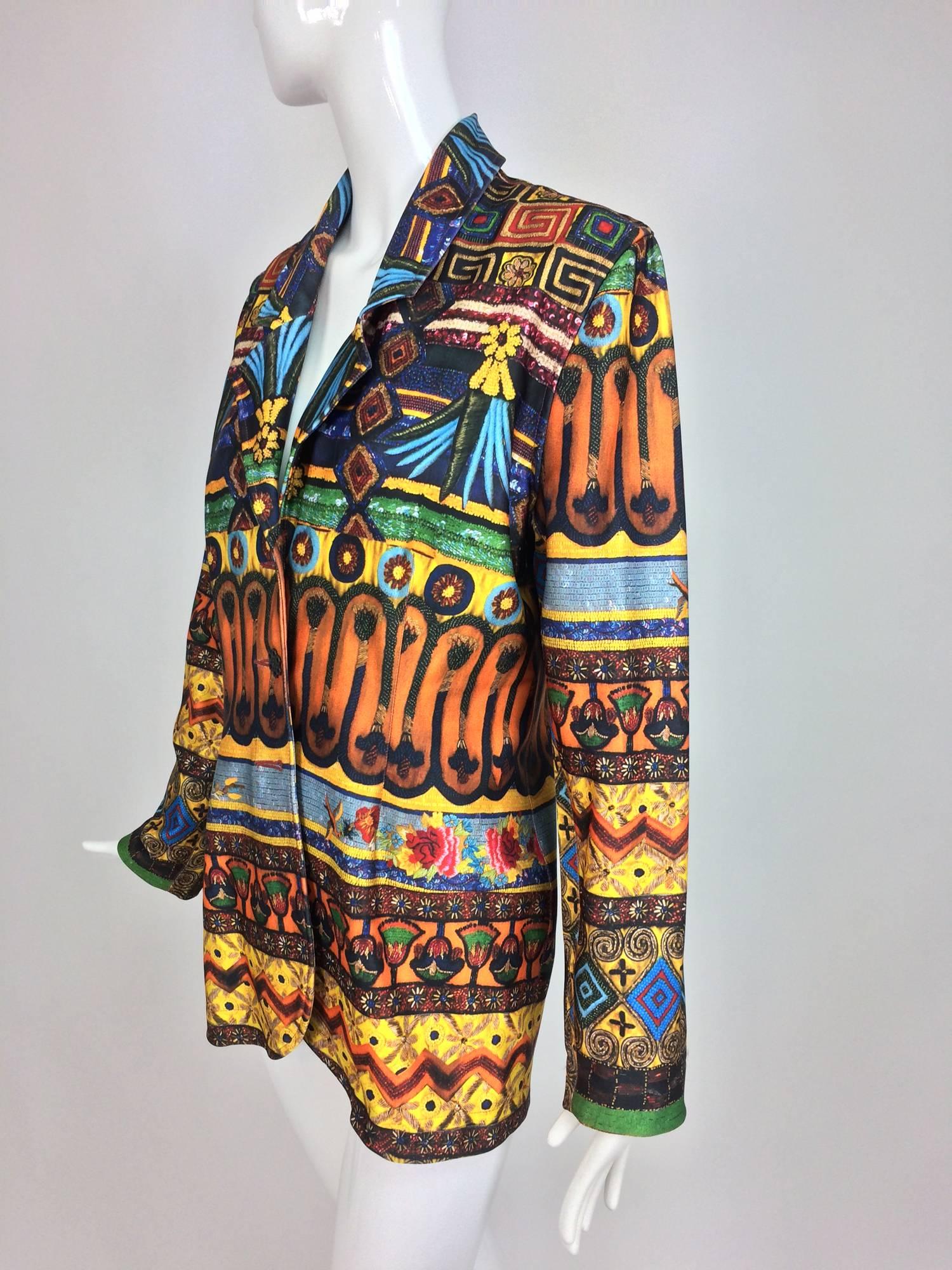 Vintage Todd Oldham Nile Mix print blazer hip length S/S 1994...Jewel bright print done in a modern, for the time, polyester/Lycra blend...Single breasted fitted jacket with long sleeves and notched collar lapels...Fabric has a bit of stretch...It's