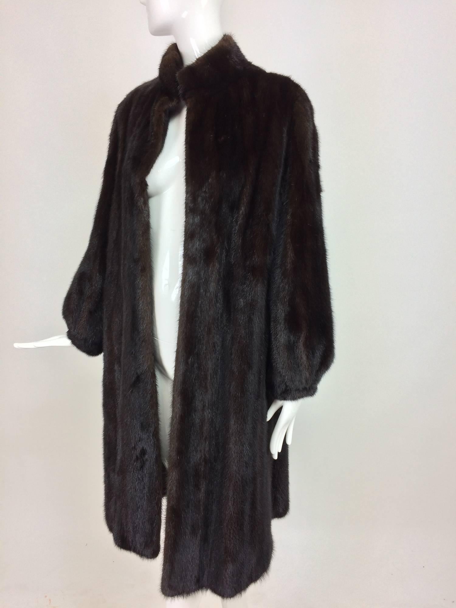 Women's Full length lustrous dark mink coat with gathered cuffs 1960s