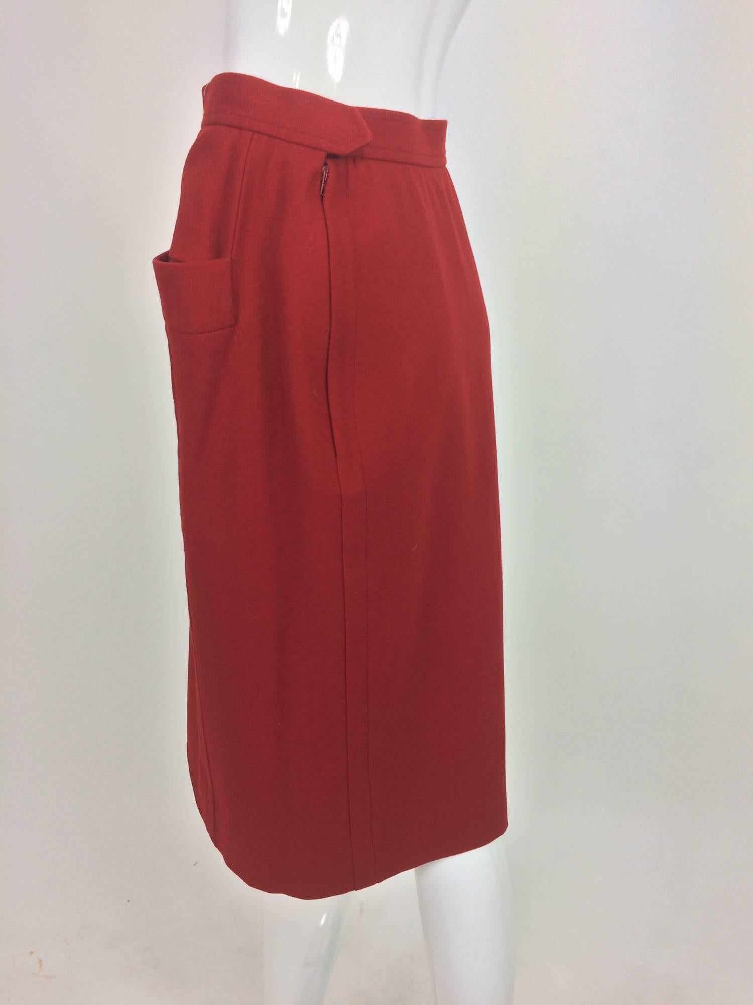 Women's Vintage Yves Saint Laurent brick red wool skirt with hip front pockets 1980s