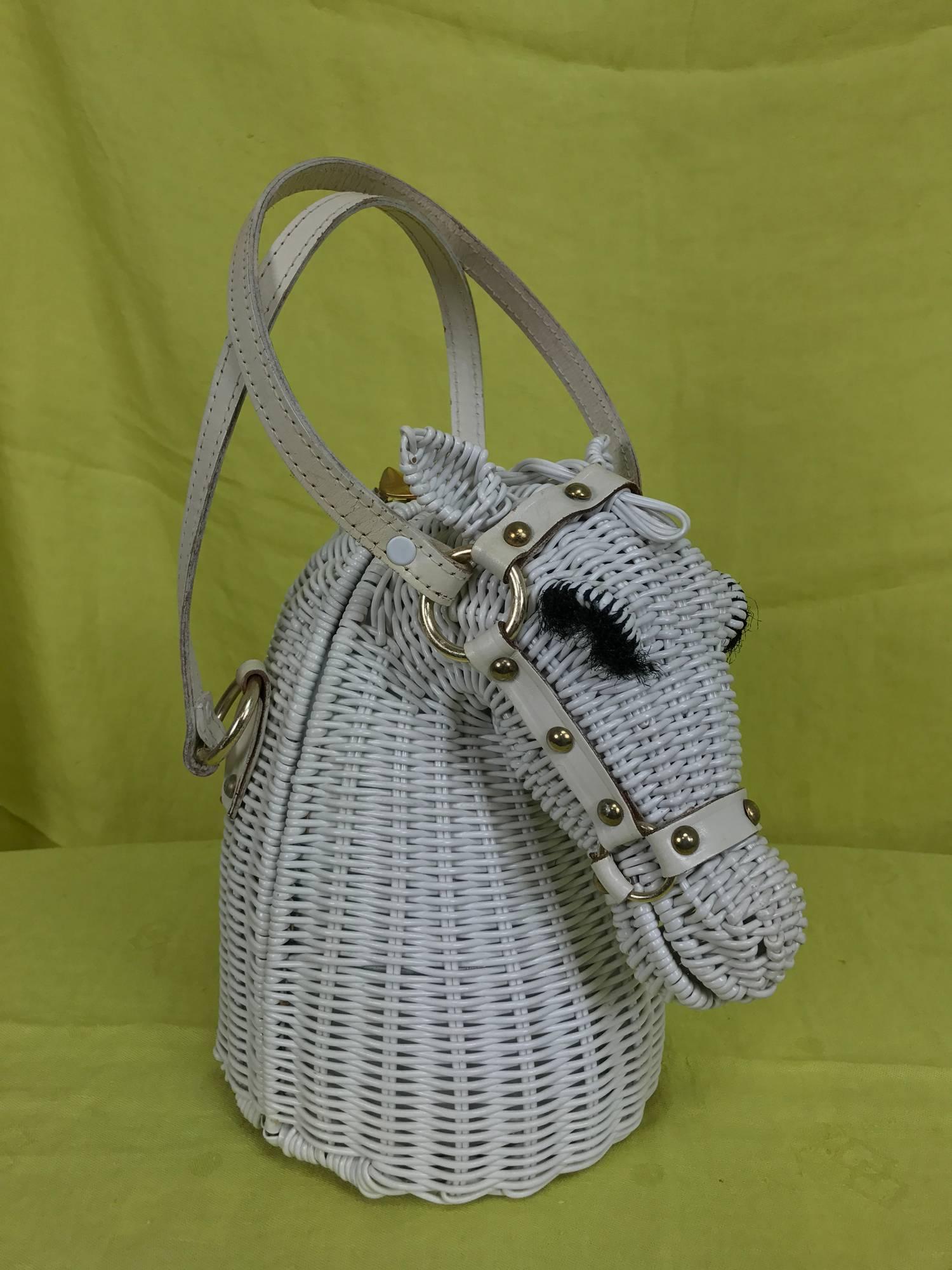 Marcus Brothers of Miami rare white wicker horse head with eyelashes handbag from the early 1960s...White wicker handbag in the shape of a horse head, with stand up ears, a white leather and brass bridle and thick black eyelashes, this is the only