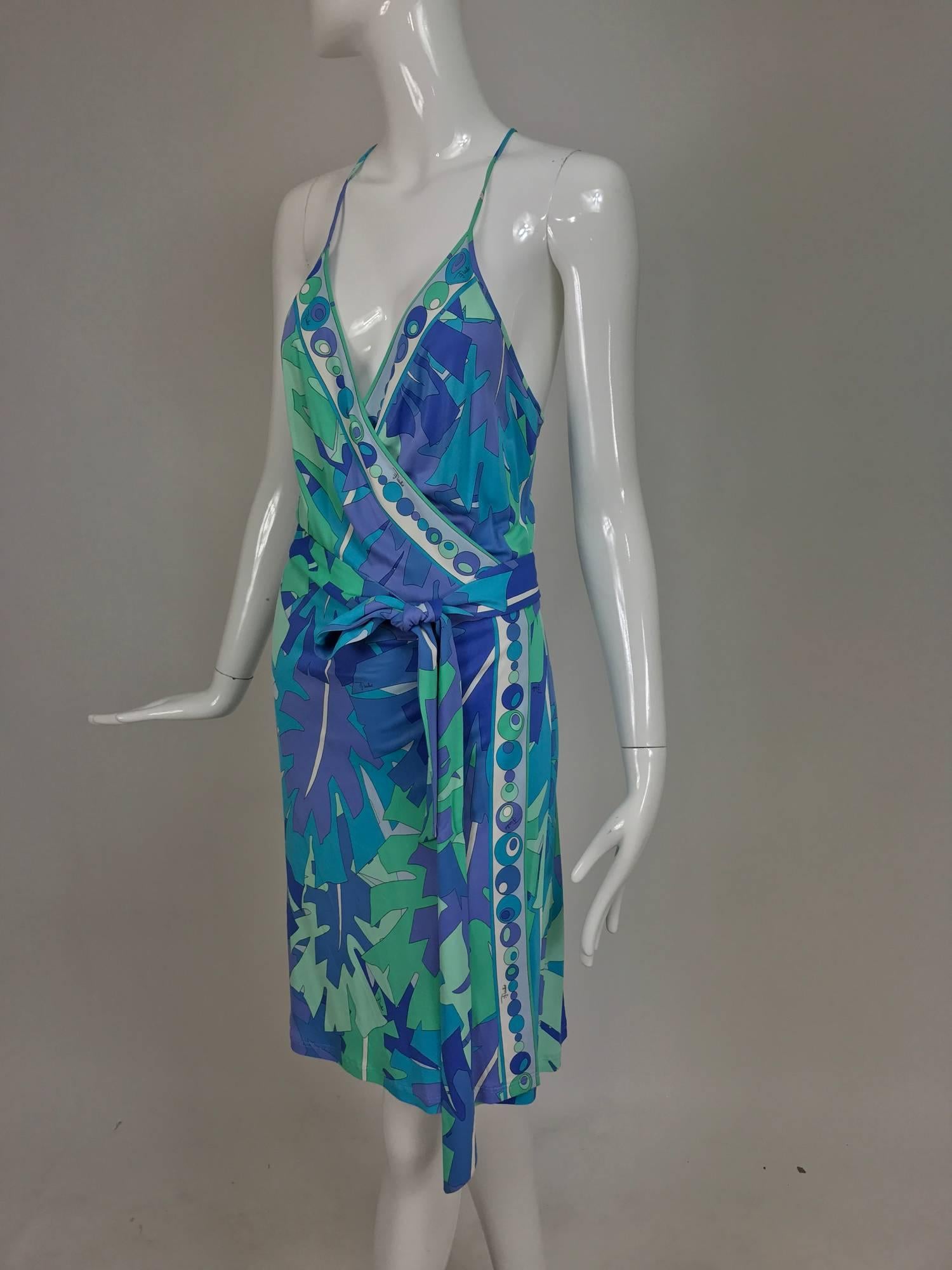 Pucci tropical print silky rayon jersey halter wrap dress in blue, lavender, green, powder blue and aqua...Wrap front with attached side ties, creates a plunge V, racer back...Marked size US10...

In excellent wearable condition... All our clothing