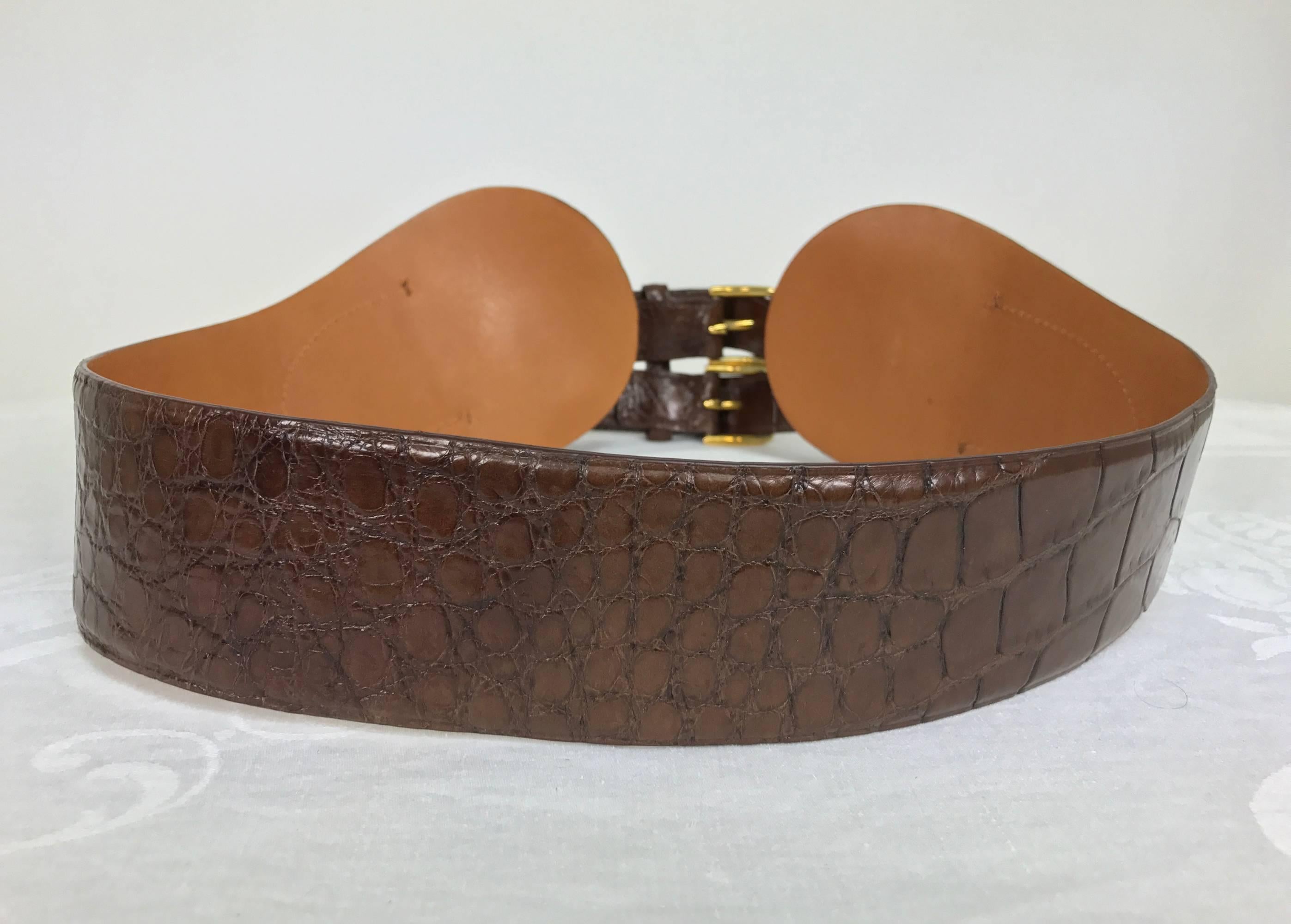Ralph Lauren wide double strap cognac alligator belt with brass hardware size medium...This belt is barely worn and in beautiful condition...
Measurements are: 
38