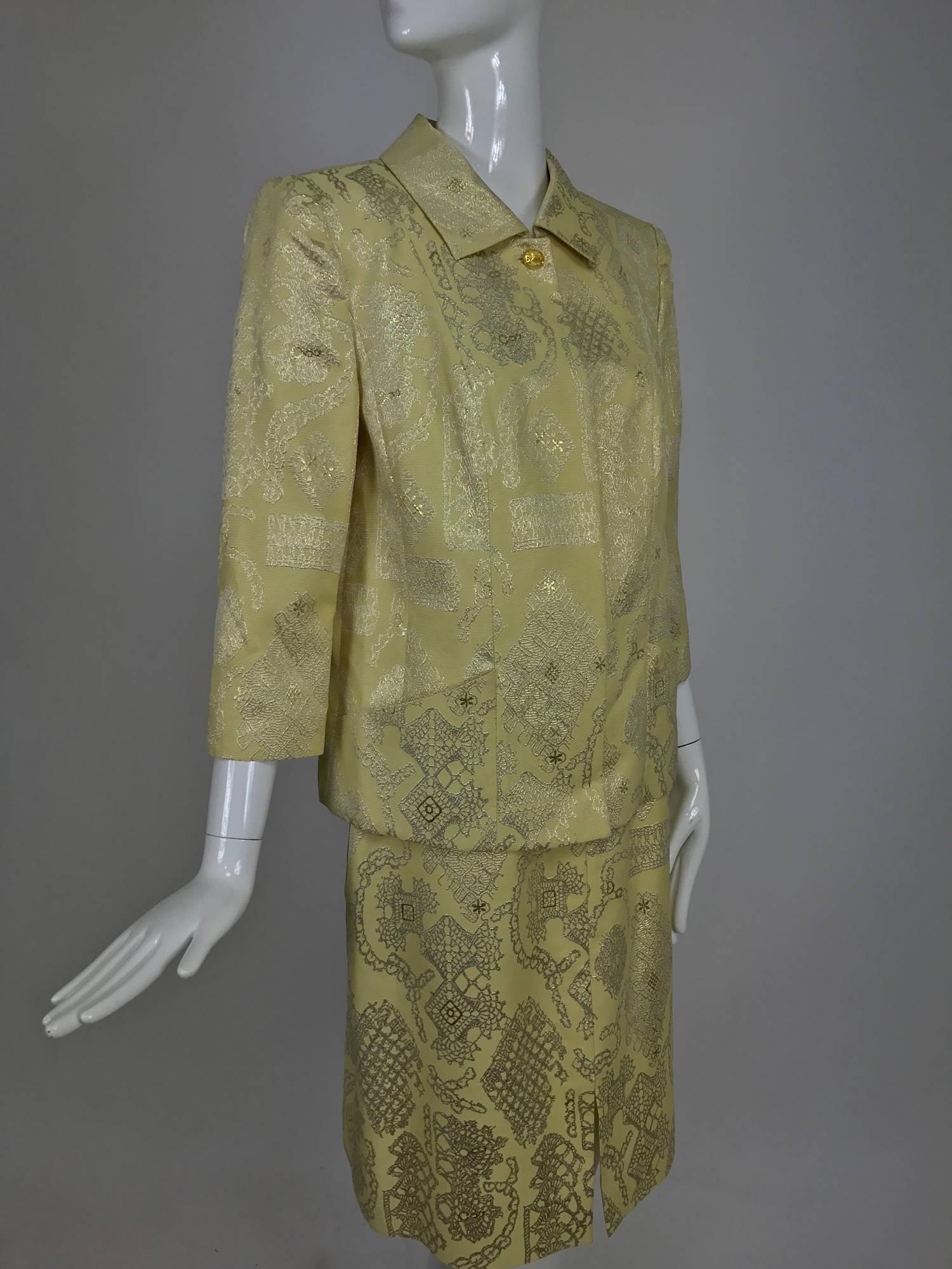 Vintage Christian LaCroix 2pc metallic brocade jacket and skirt 1980s...Yellow and silver brocade, the jacket is loose fitting with 3/4 length sleeves that have a vent at the cuff...Closes at the neck with a single button that is clear yellow