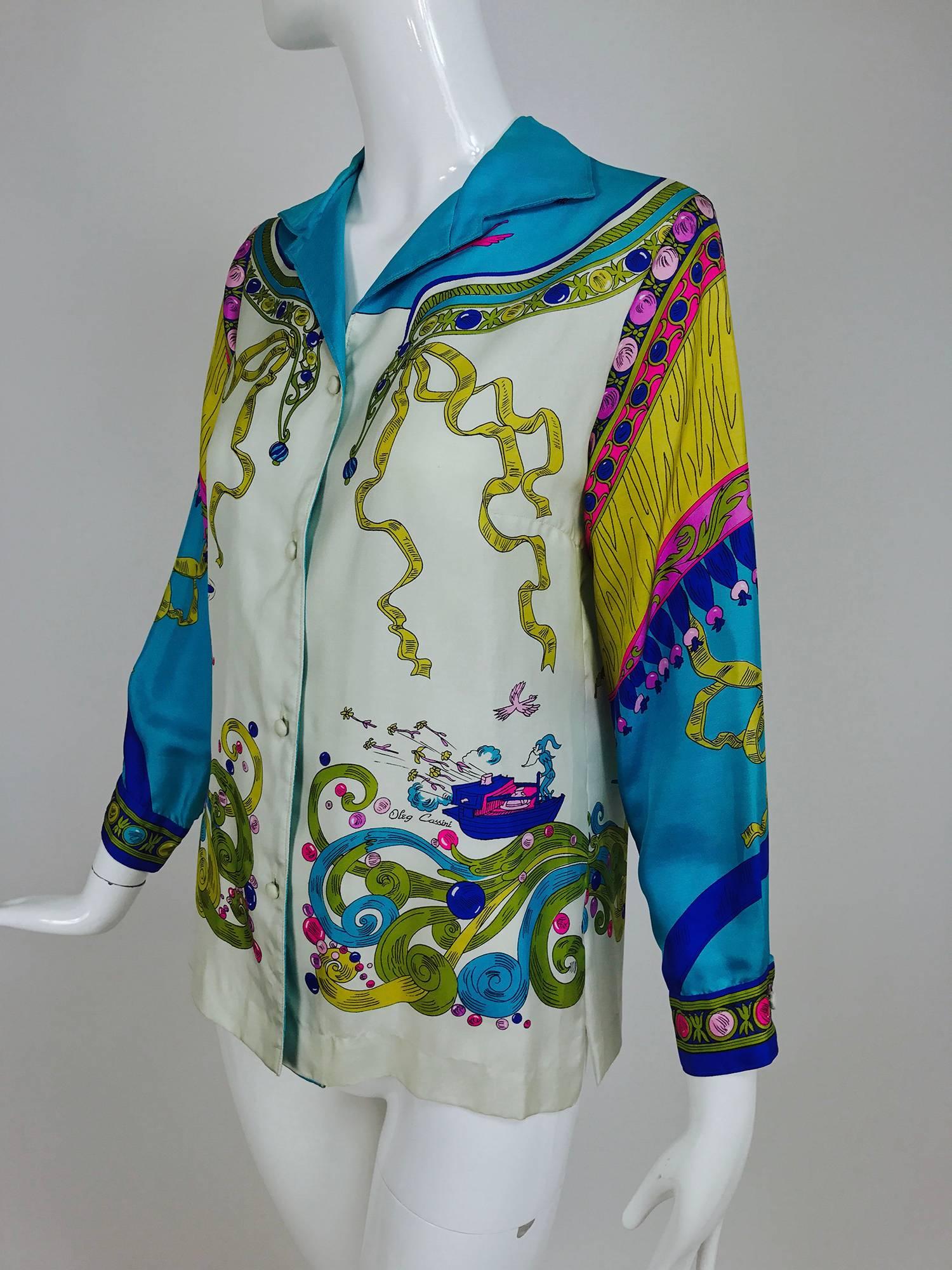 From the early 1960s an enchanting print 100% silk blouse from Oleg Cassini...Cherubs, ribbons, Ferris wheels, shooting heart arrows, nymphs in bright colours makes a statement blouse!  Blouse closes at the front with self buttons, bracelet length