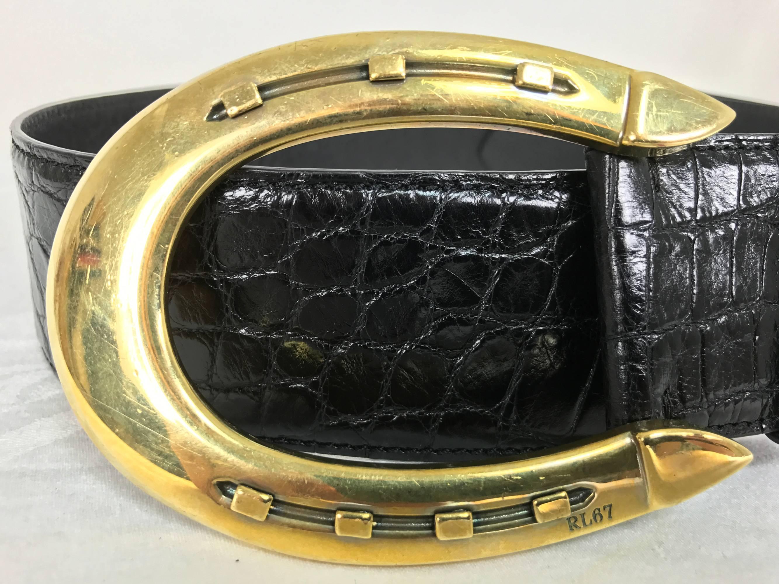 Beautiful Ralph Lauren glazed black alligator belt with a heavy gold horseshoe buckle marked size medium...In excellent condition, looks unworn.
Measurements are:
2