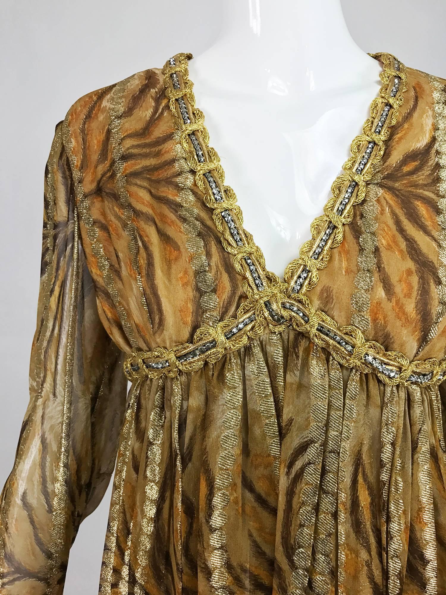 Fabulous Bill Blass golden metallic stripe silk chiffon, tiger print cocktail dress with gold cord and crystal rhinestone trim at the deep V neckline, under bust band and cuffs...The skirt is open pleats that fall from the high waist bodice...Long