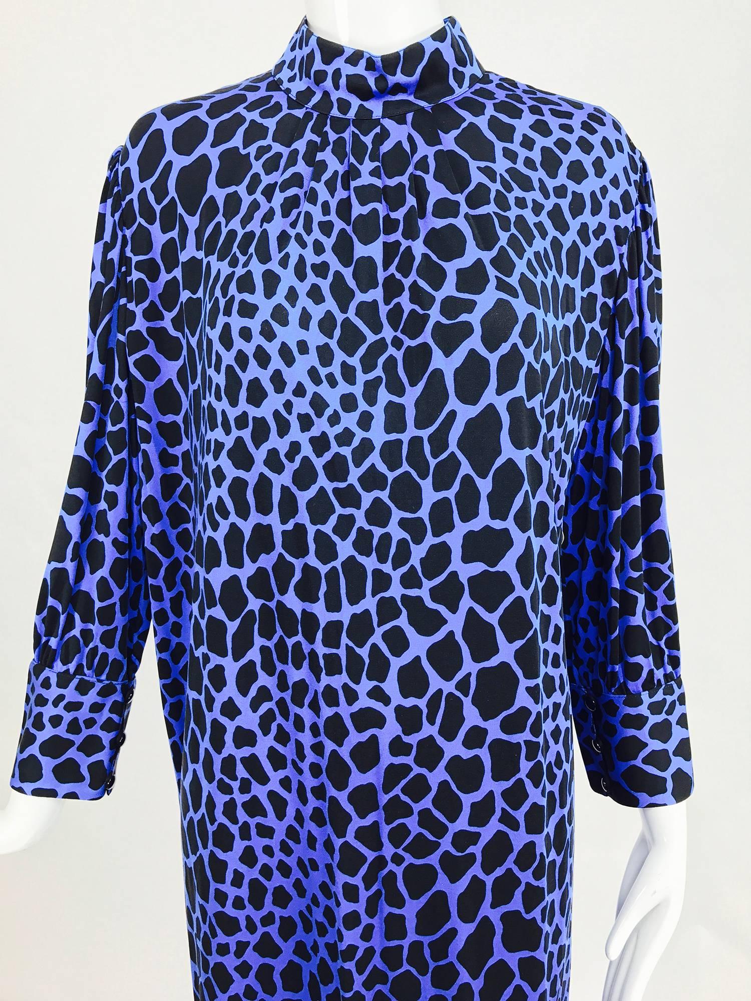 Gibi, Roma black and blue leopard spot fine silk jersey dress from the 1970s ...Mock neck dress, with long sleeves that have banded button cuffs and wrists, the dress is lightly gathered at the neck front and falls straight to hem...Unlined...Closes