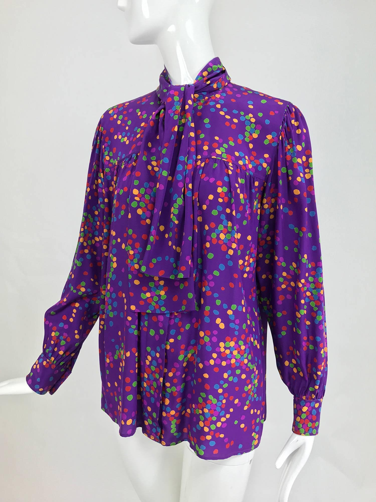 Vintage Yves Saint Laurent purple and coloured dots silk bow tie blouse 1970s...Great colour combo print on the silk blouse from Rive Gauche...Bow tie neckline, the blouse closes at the front with buttons, long full sleeves with banded button