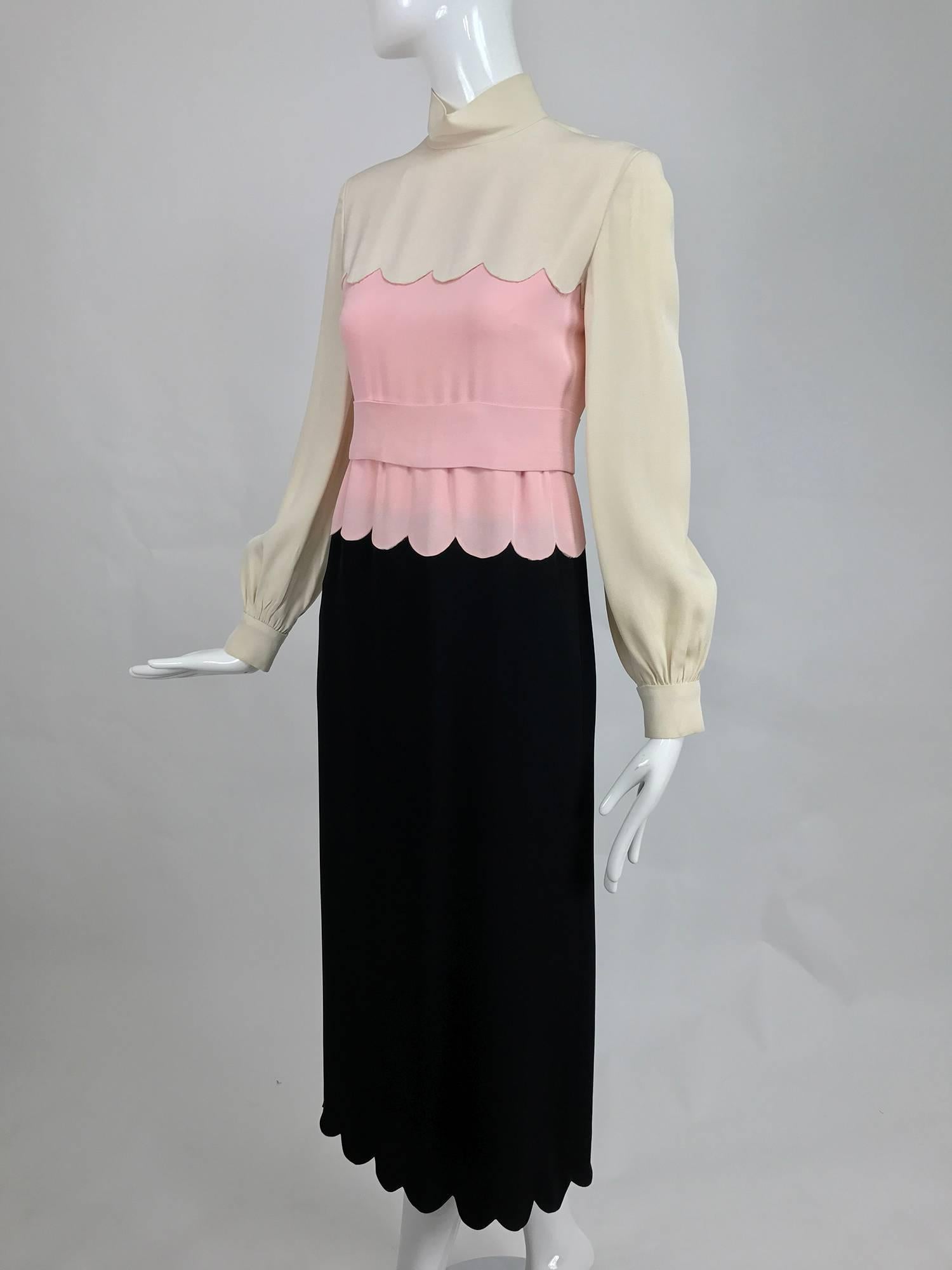 Donald Brooks scalloped crepe dress in cream pink and black from the 1960s...This beautiful little dress is artfully constructed with an eye to geometry, without the angles...Precision tailoring and an eye for detail, it is what set Donald Brooks