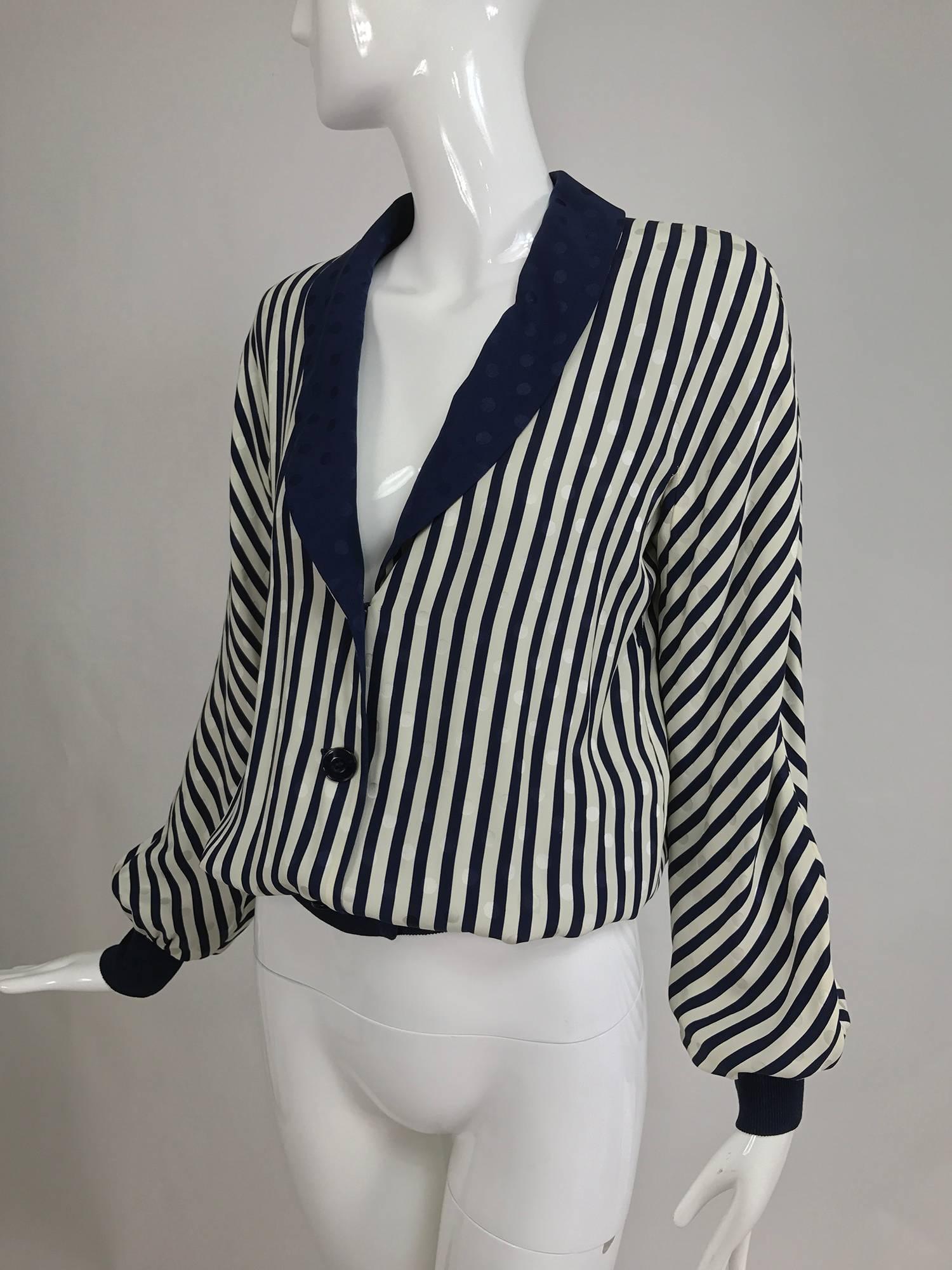 Valentino Boutique lightweight navy and white figured silk bomber jacket from the 1990s...Shawl collar jacket closes at the front with four buttons, long sleeves have knitted navy cuffs as does the jacket hem...Fully lined in navy figured