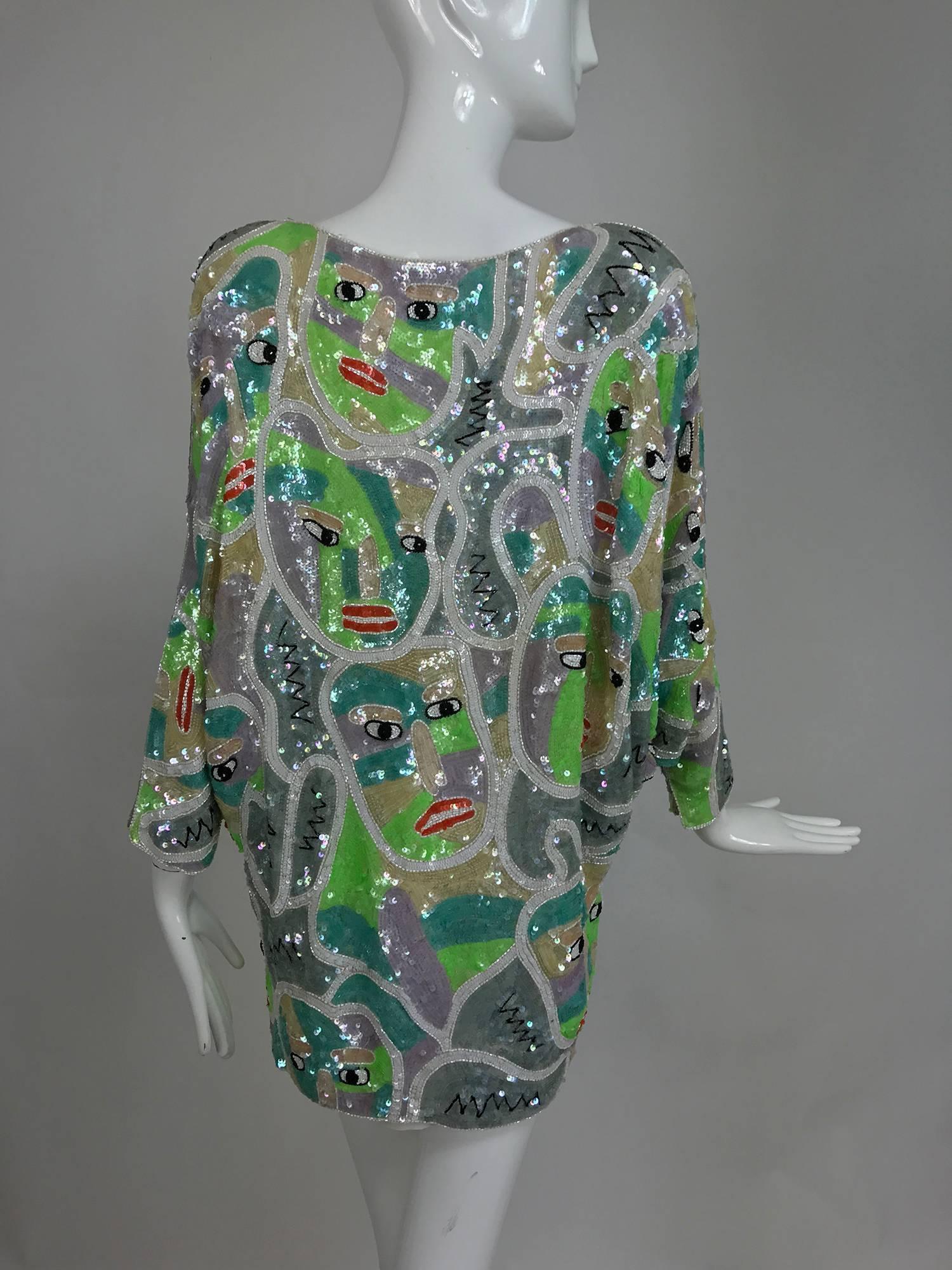 Women's Glittery sequin encrusted bat wing mini dress with modernist faces 1980s
