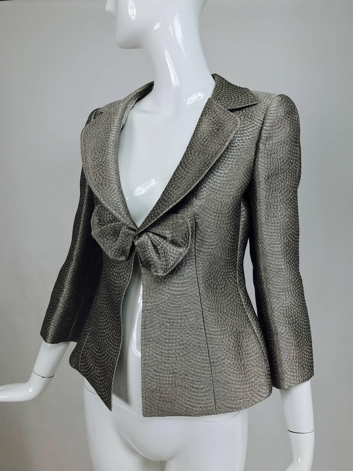Armani Collezioni textured silver metallic plunge bow front jacket...Sexy jacket in an unusual wool blend jacket (doesn't feel like wool)...Princess seamed front and back, 3/4 length sleeves...Bow with hidden button closure at the low bust...Marked