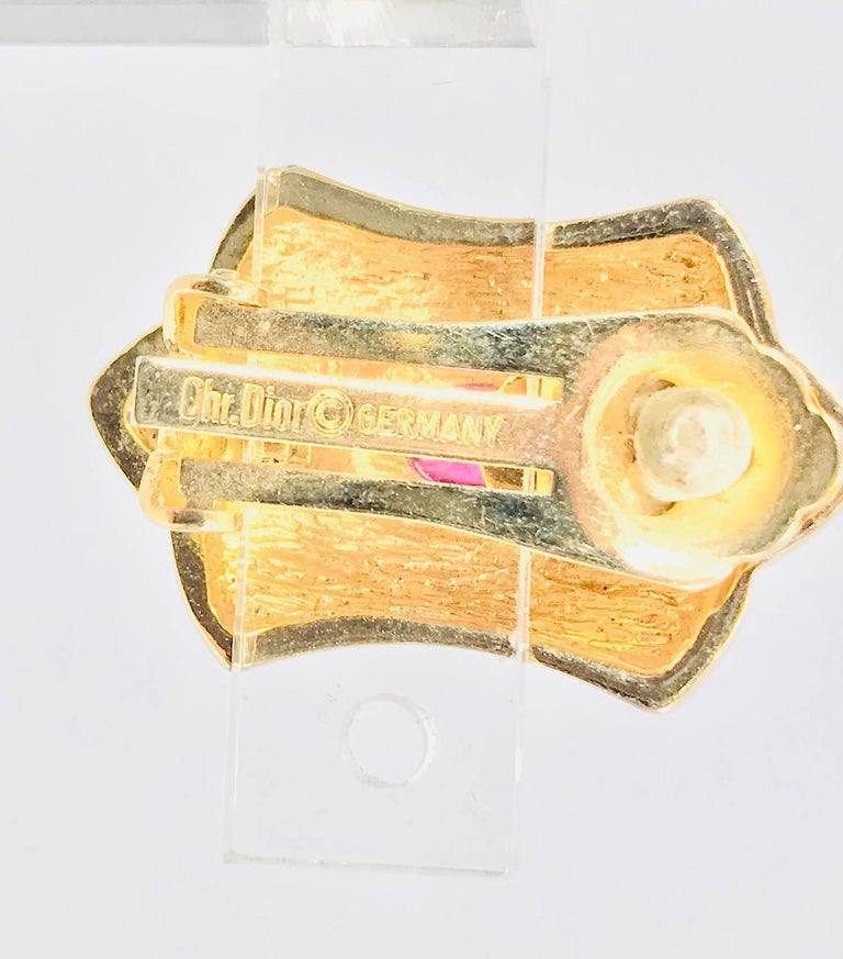 Christian Dior Germany gold and rhinestone red stone center earrings