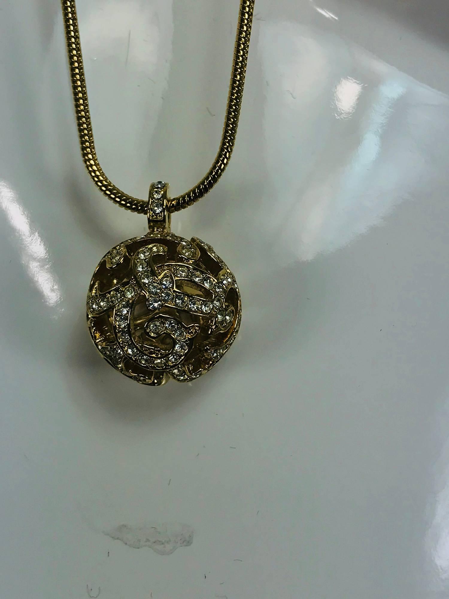 Christian Dior gold snake chain with open work rhinestone orb drop necklace in excellent condition.
Measurements are:
16 1/4
