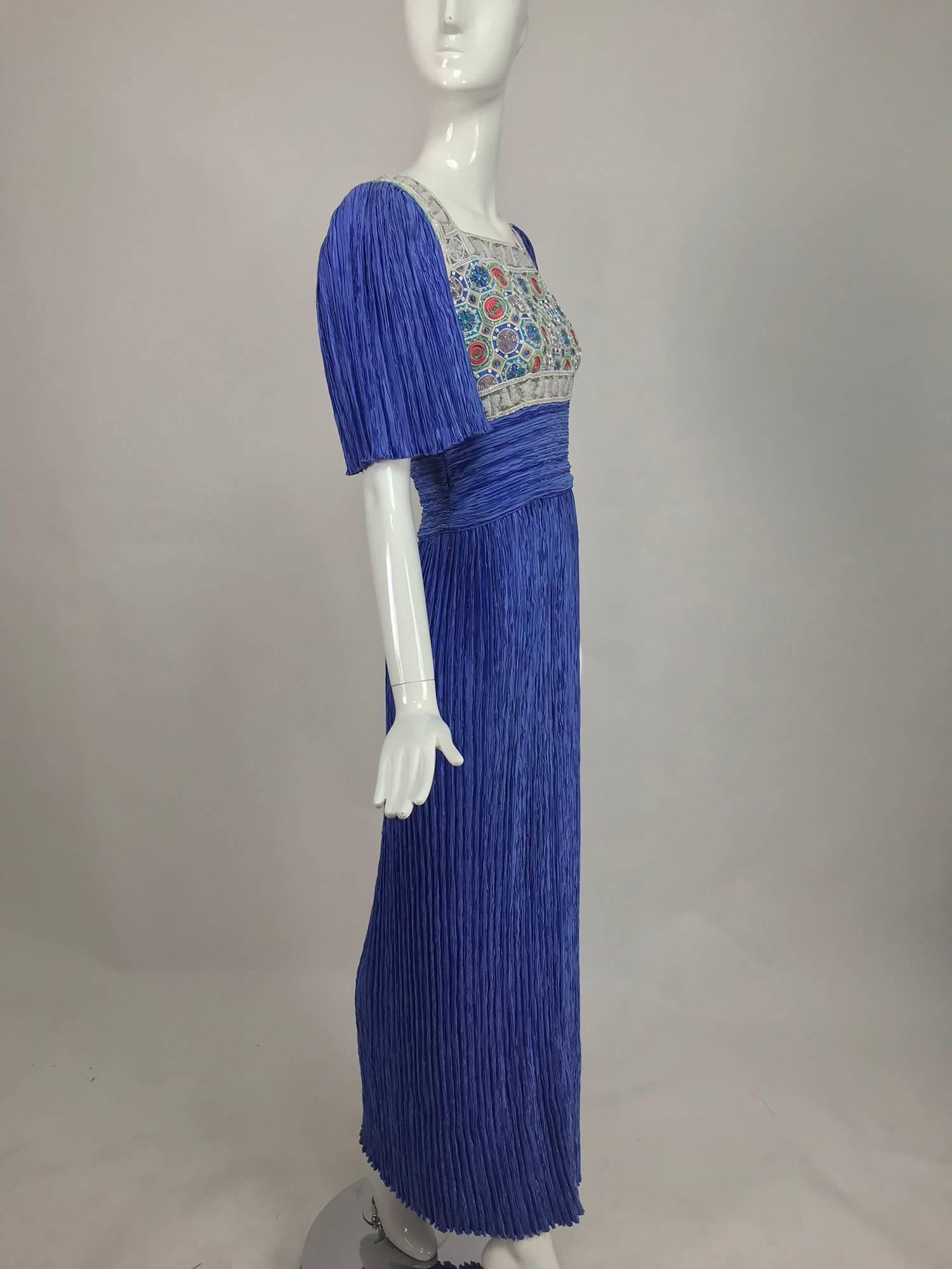 Mary McFadden beaded Fortuny style pleated evening gown from the 1980s. This dress is an amazing shade of blue, a dark cornflower I think, but colour is in the eye of the beholder! The bodice of the dress reminds me of Moroccan tiles, this done in