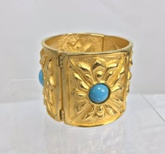 Karl Lagerfeld chunky gold cuff with turquoise cabochons