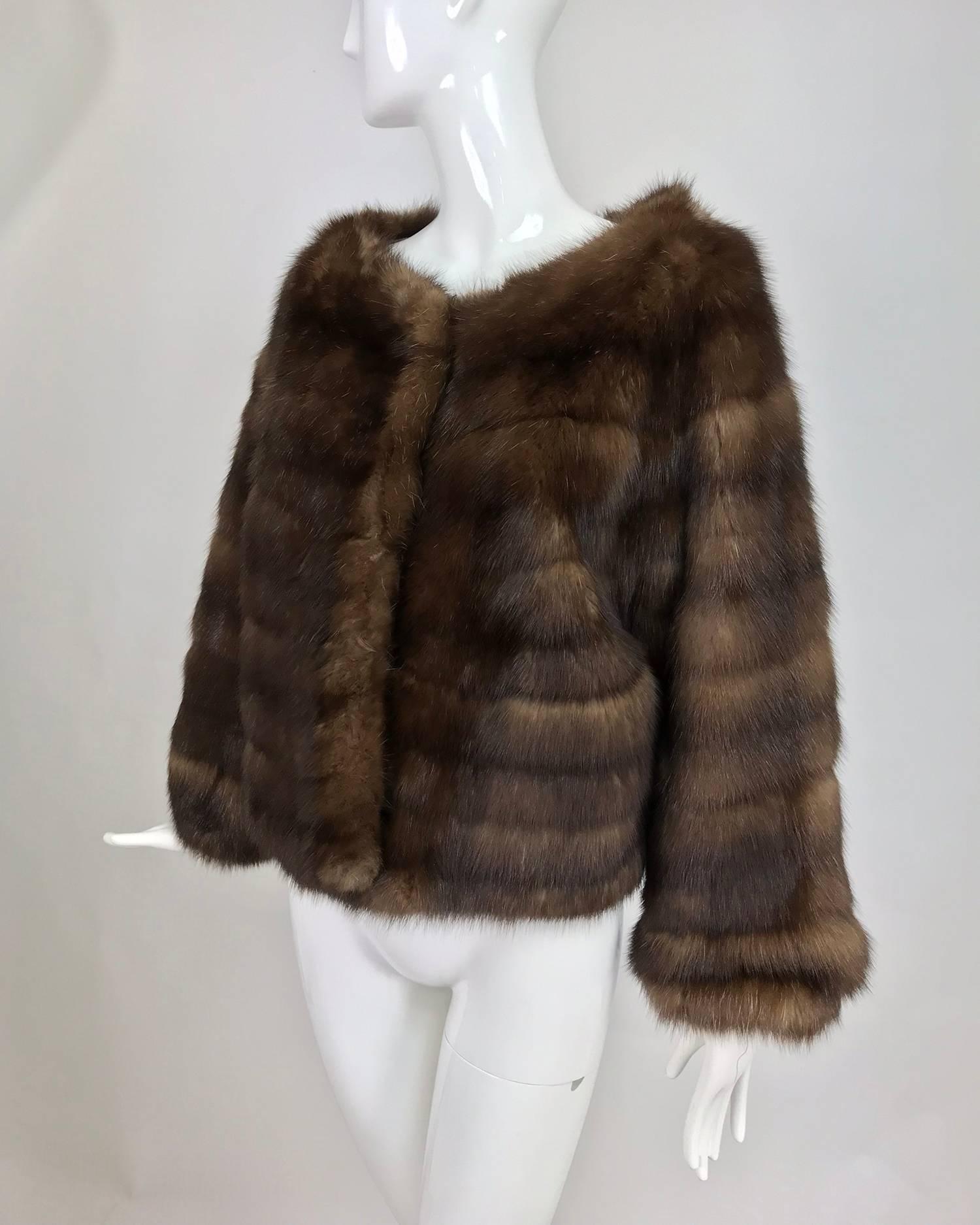 Natrural sable jacket from S J Glaser furs New York 1960s...This beautiful jacket is hip length, depending on your height, see measurements below...Open neckline perfect for turtle neck sweaters or amazing scarves...Long sleeves with gathered cuffs,