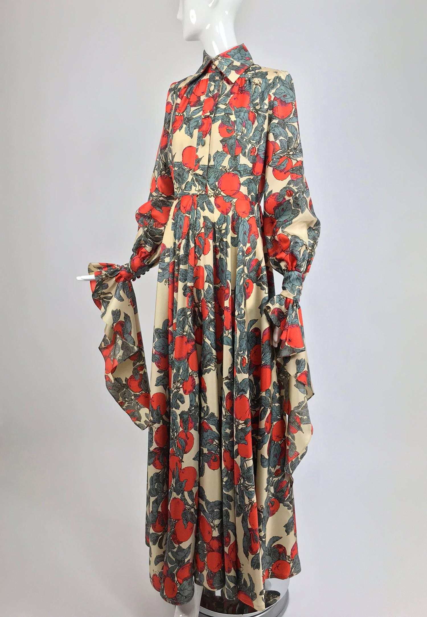 John Bates iconic apple print dress for Jean Varon 1970s...Fantastic print on a dress of acetate twill (feels like silk), the design is so evocative of the period!  Button front fitted bodice dress has self covered buttons, closes high at the neck