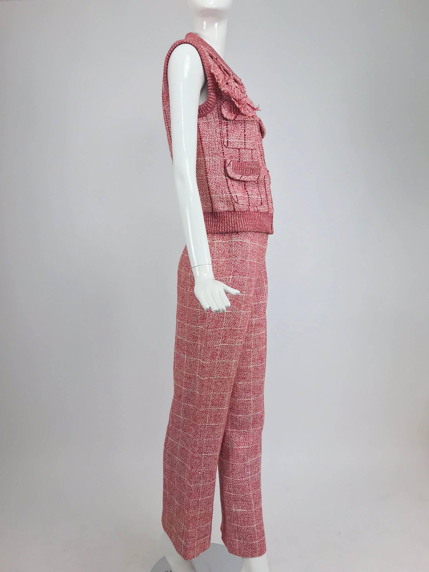 Chanel red and white plaid sequin trim vest and trouser set 2001P...Sleeveless vest has round collar, ribbed knit armscye and hem, four open flap pockets with rib knit detail...Original matching flower pin...Front zipper closure...The vest is