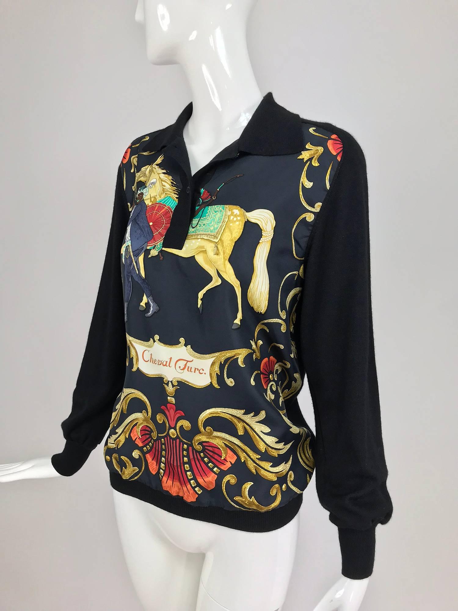 Hermes black fine wool sweater with silk Cheval Turc, printed silk twill front...Pull on top has raglan sleeves, button front placket with narrow collar, ribbed cuffs, the back is knitted...Marked size 36
In excellent wearable condition... All our