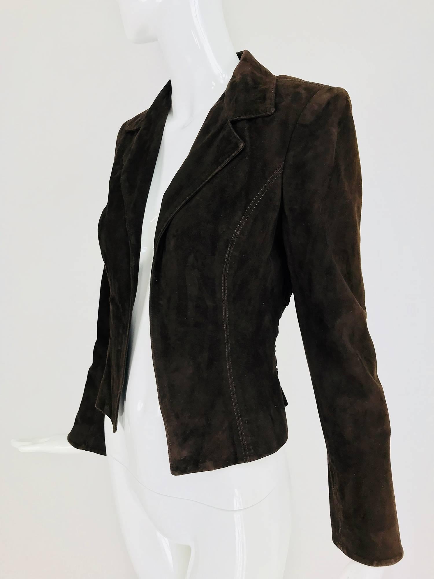 Valentino Chocolate brown top stitched suede jacket with ruched waist back. Cropped buttery soft suede princess seam jacket is fitted through the waist, with notched lapel collar and long sleeves. The jacket has no closures at the front. The back