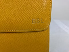 Hermes Mustard yellow pebbled leather clutch