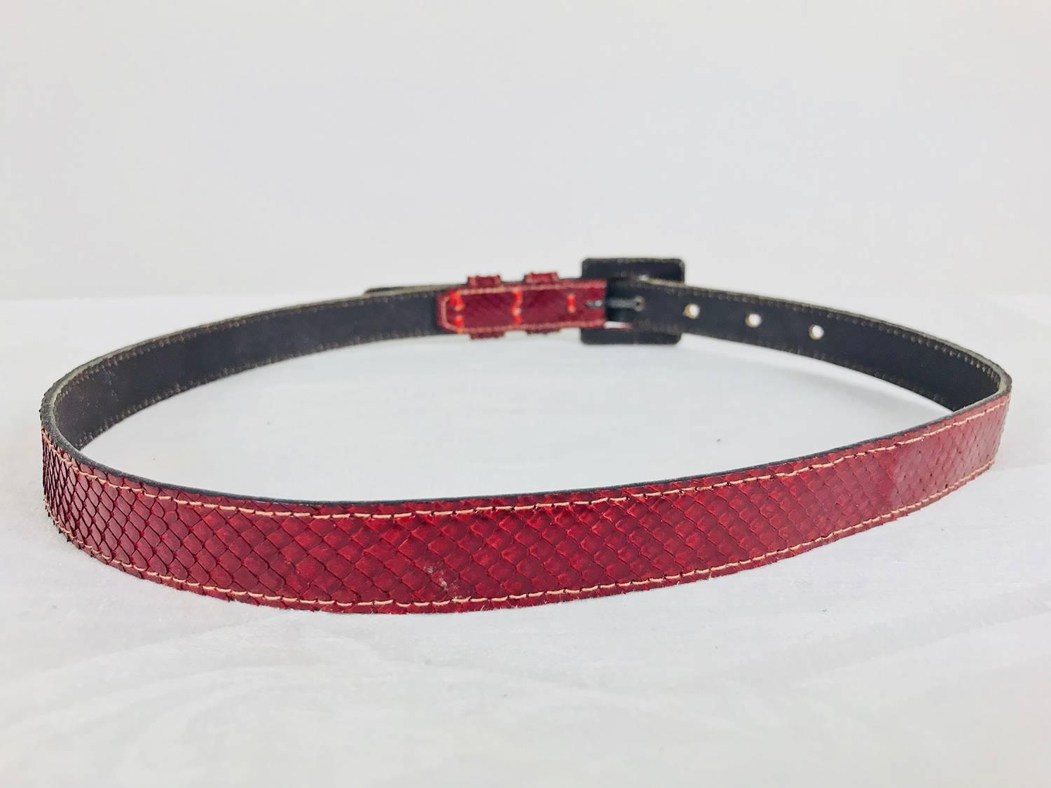 Yves Saint Laurent skinny Red snake skin belt from the 1970s. Marked size small. 
Measurements:
30 3/4