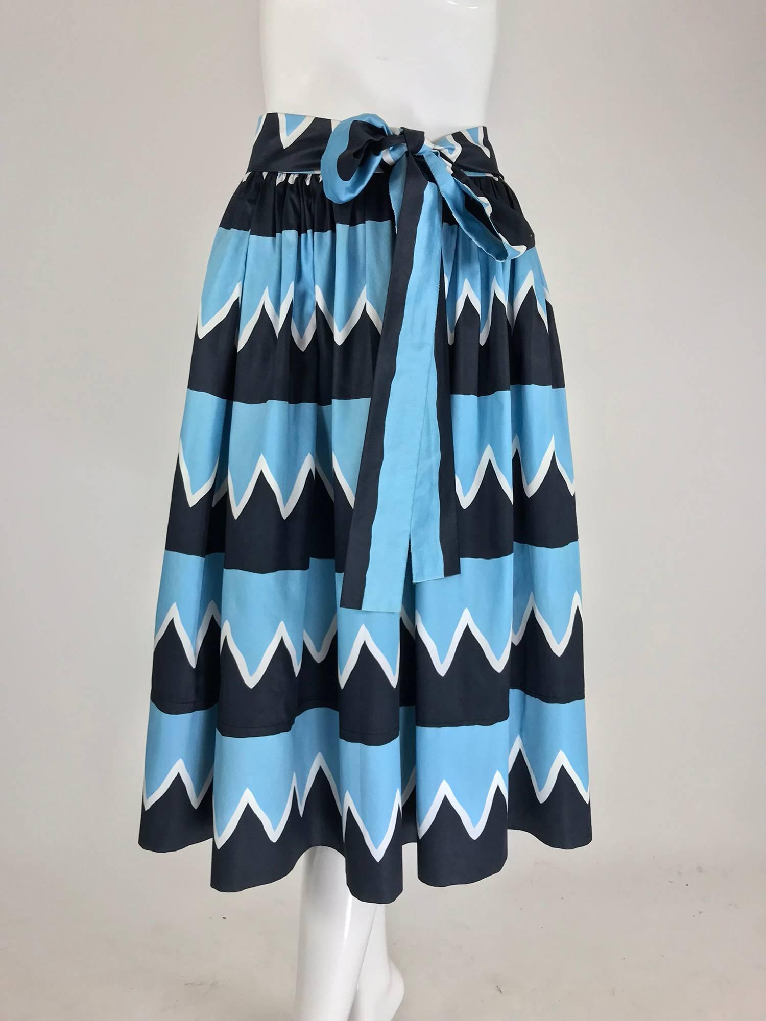 Yves Saint Laurent documented cotton skirt 1970s S/S 1980 Rive Gauche. Famously worn by model Iman in the advertisement for Rive Gauche, photographed by David Bailey. This skirt is eye-catching with bold geometric print in blue, black and white. The