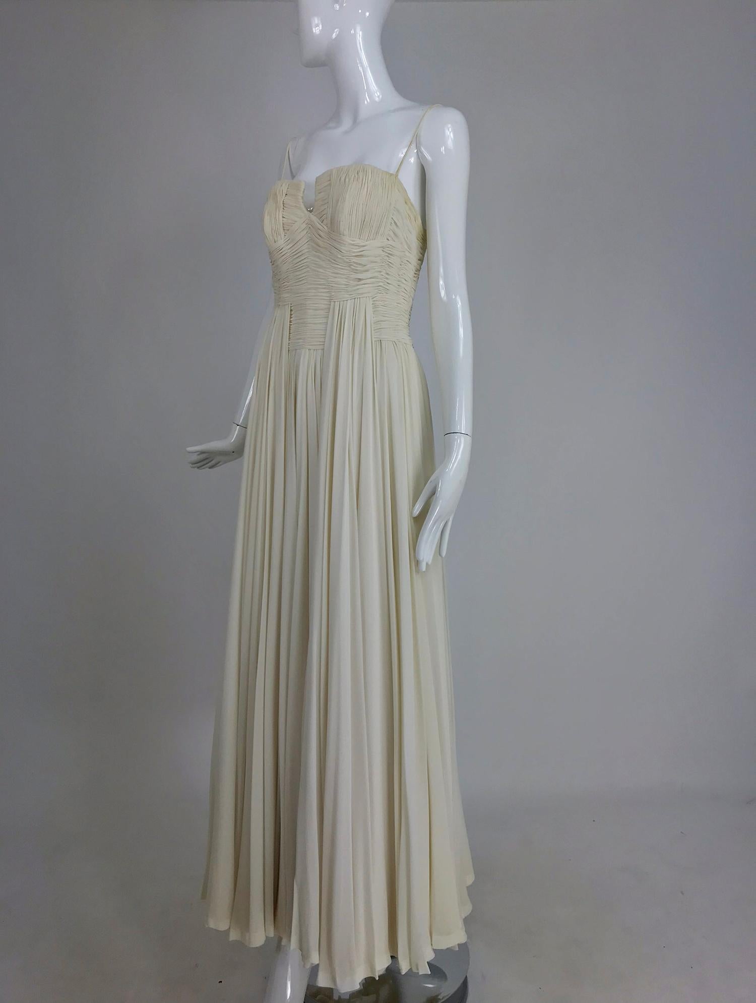 Fernanda Gattinoni Couture Ivory pleated silk chiffon evening gown from the late 1950s.  In 1906, 17 year old Fernanda Gattinoni left Italy for London to apprentice at the Molineaux fashion house, a leading atelier of the day. She turned down an