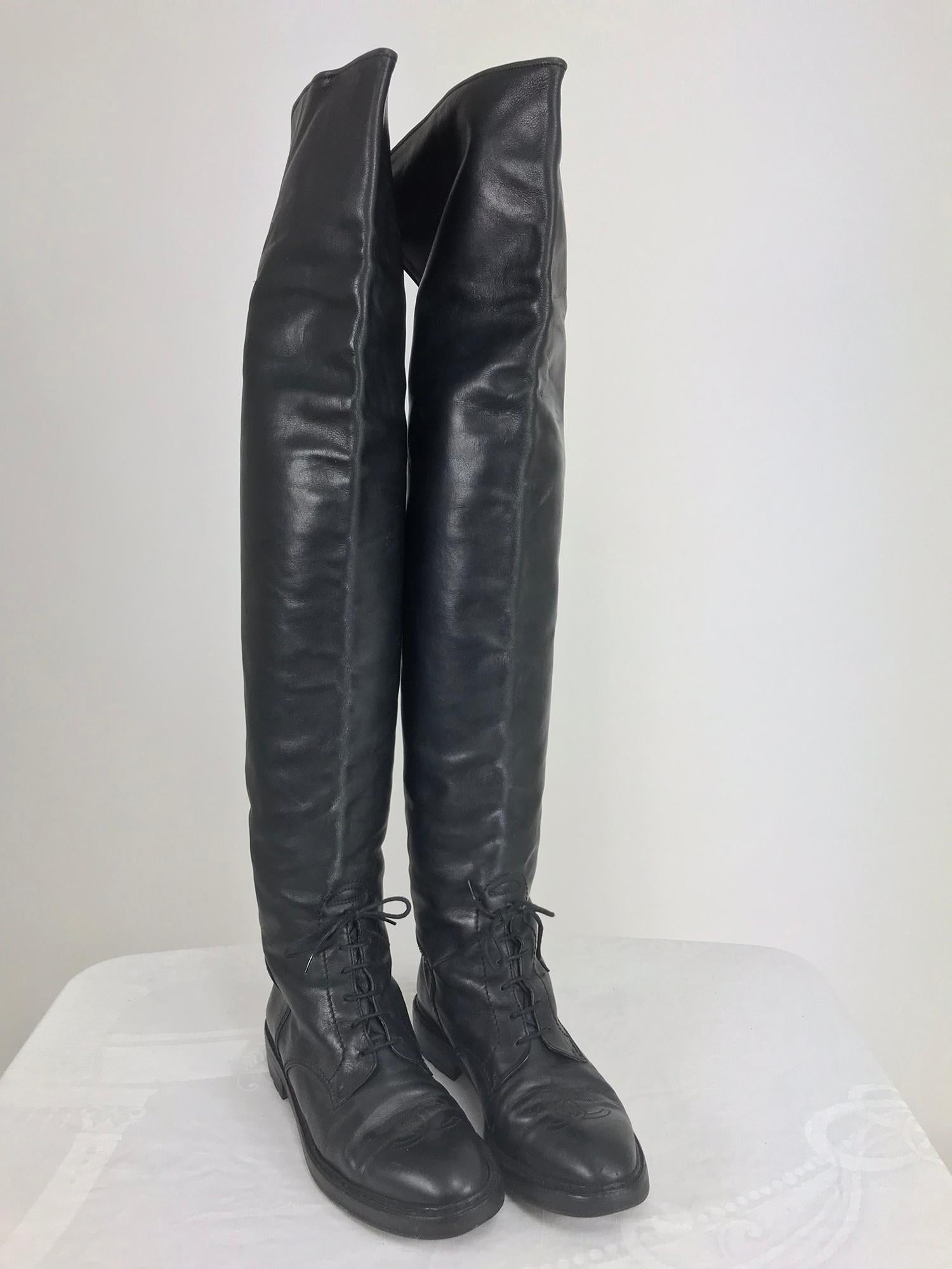 Chanel Over the knee black leather riding boots, Claudia Schiffer editorial worn 1990s. These boots are amazing, traditional riding boot style, with the addition of tops that can be worn up, thigh length, or turned over in a cuff. The leather has a