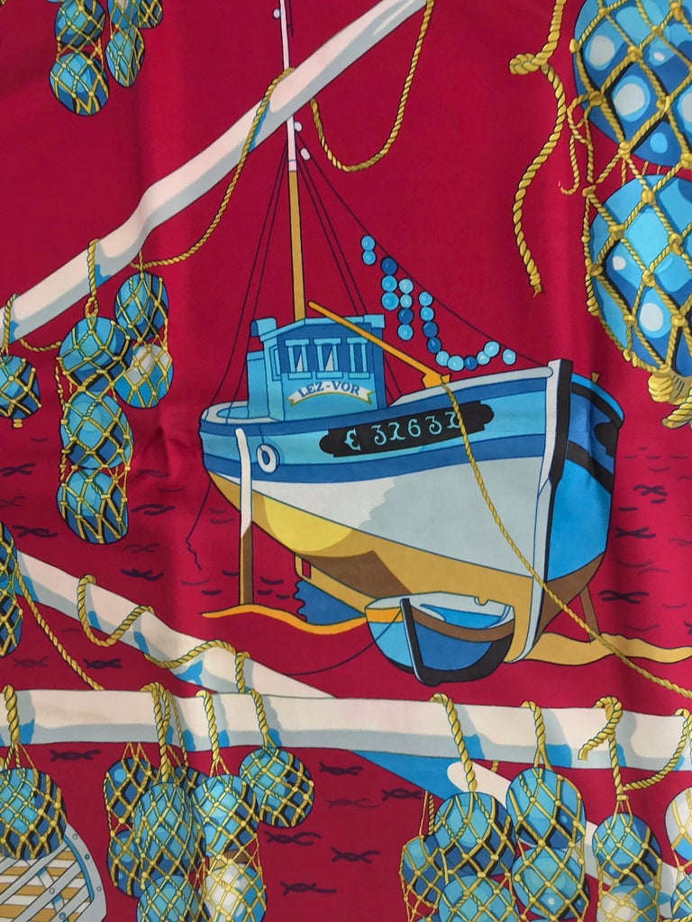 Hermes Les Raisins de la Mer Silk Scarf designed by Pierre Péron 1967  35 x 35. Lovely view of the fishing boats of France, surrounded with floats, oars, nets and masts. Beautiful colourway. In excellent condition, with only a light mark in the