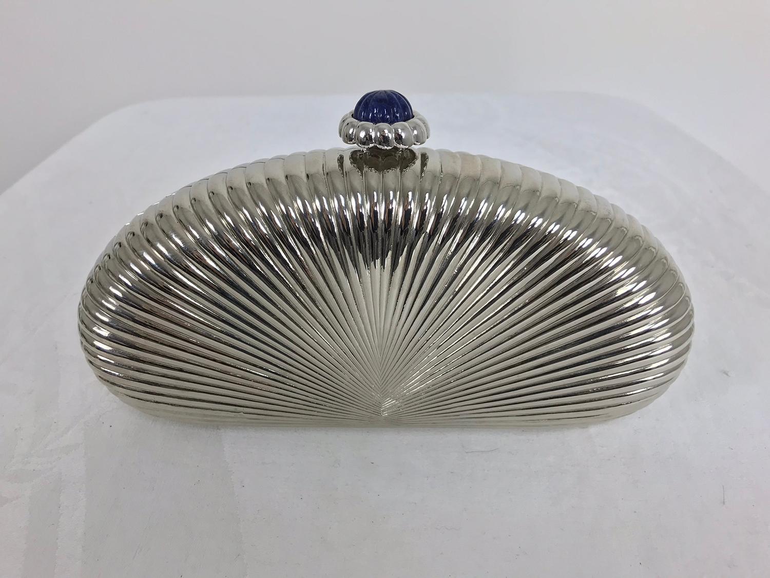 Judith Leiber silver sunburst hardside evening clutch or shoulder bag...Beautiful bag with jewel silver chain handle strap, press to open blue stone set top...Interior lined in silver...Looks barely, if ever worn...original tag price