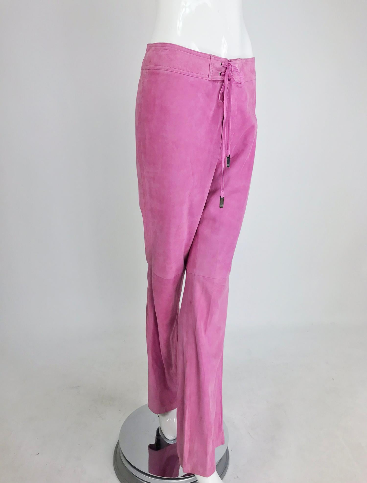 Ralph Lauren Black Label pink suede trousers. Buttery soft suede in bubblegum pink, banded waist trouser laces at the front with long suede ties. Flared legs. Lined from waist to knee. Marked size 8. 
In excellent wearable condition... All our