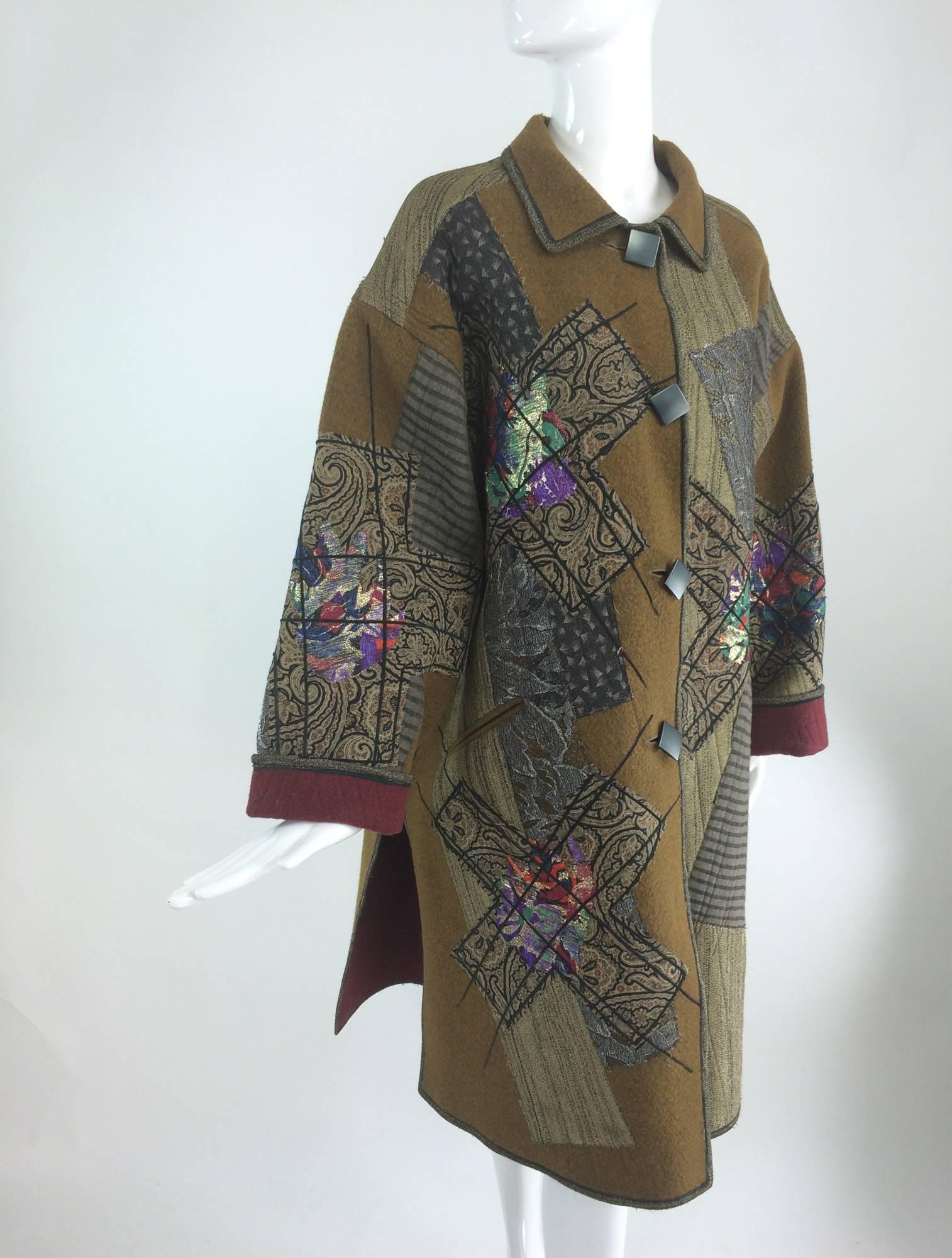 Koos Van Den Akker-Peter DeWilde wool collage big coat 1990s...Art to wear from Koos/DeWilde's 1990s collaboration...Double face wine/tobacco wool coat is quilt appliqued with various metallic fabrics and prints that create a one of a kind work of