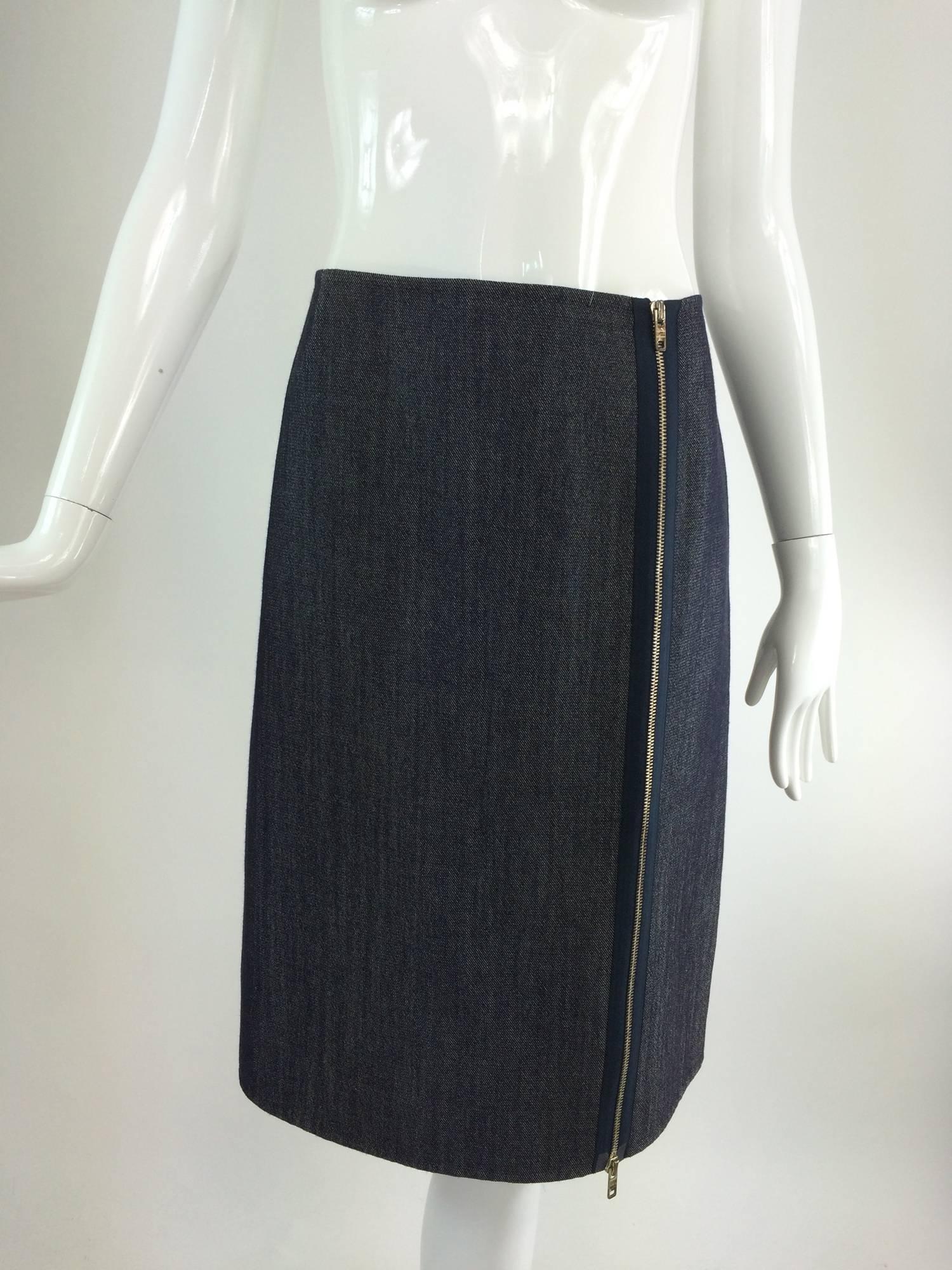 Celine finition main, zip through denim skirt...Straight shape denim skirt with a full length zip through silver metal zipper at the front side, it can be unzipped from the hem up or the waist down...Marked size 42...Looks barely, if ever,