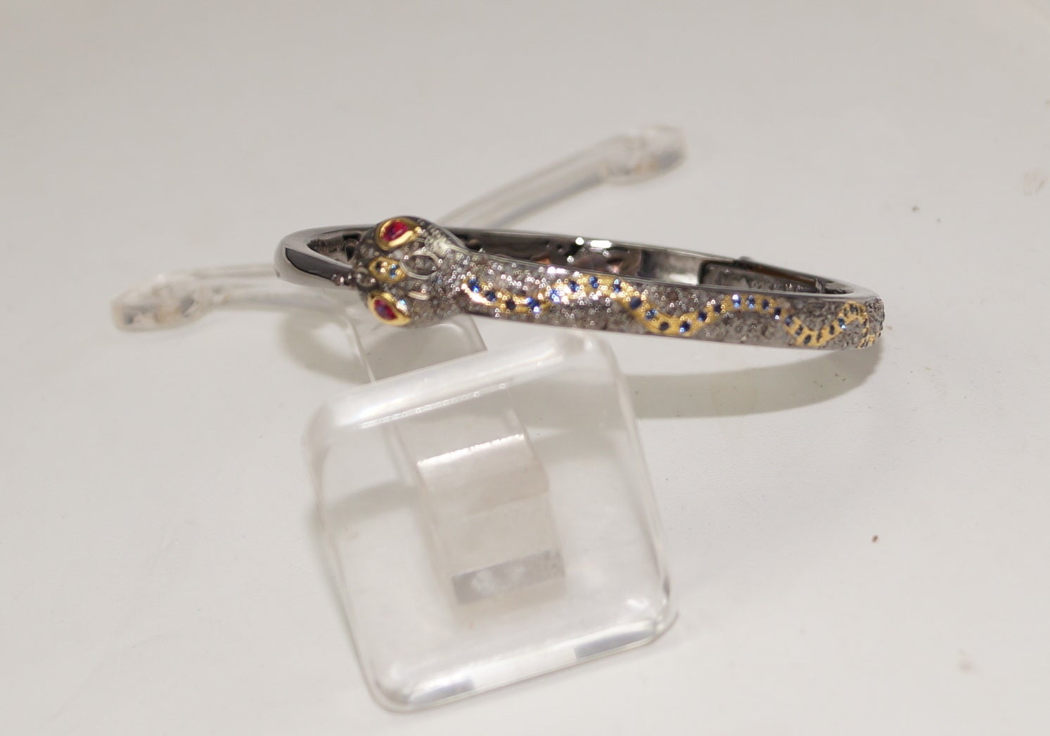 Natural pave diamond designer snake oxidized sterling silver ruby bracelet For Sale