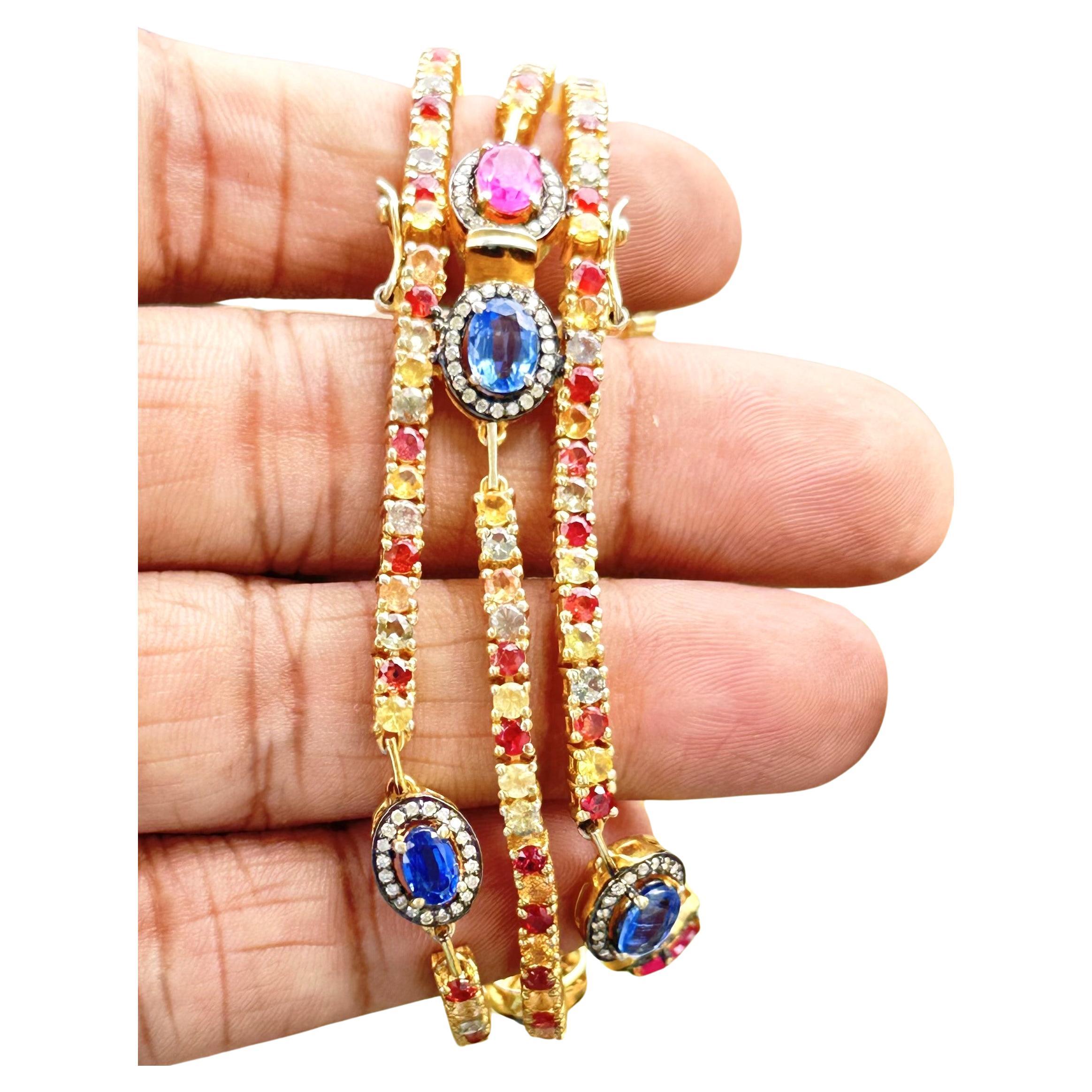 Three-Line Gold Silver Bracelet with diamonds, Sapphires, Rubies, and Emeralds For Sale
