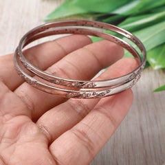 Paire de bracelets vintage emboîtables en argent oxydé, sertis de diamants en pavé