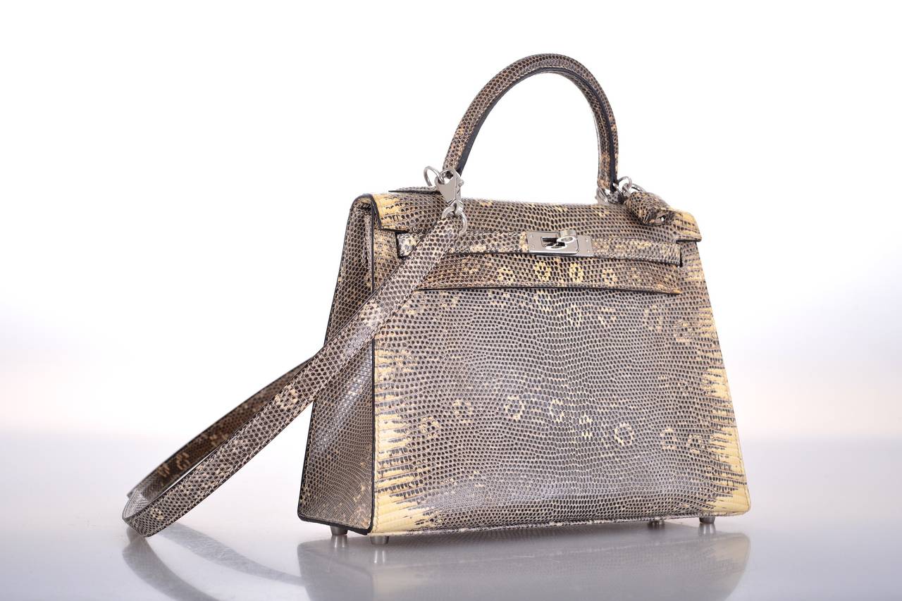 As always, another one of my fab finds! The Hermes 25cm KELLY in beautiful IMPOSSIBLE TO GET OMBRE LIZARD with PALLADIUM hardware!

From the JaneFinds personal collection.

 This bag comes with lock, keys, clochette, a sleeper for the bag, rain