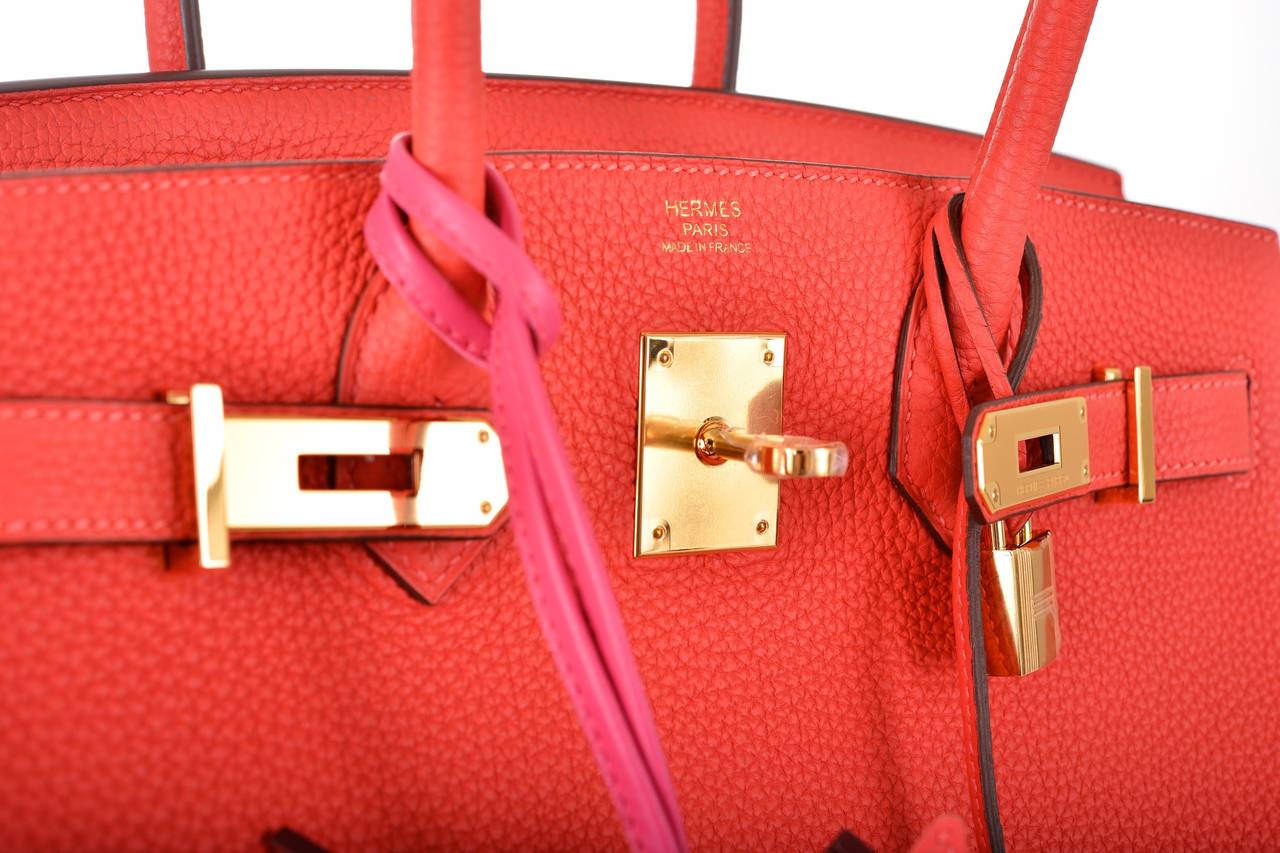 As always, another one of my fab finds! Hermes 30cm Birkin in beautiful BRIGHT ROUGE PIVOINE with GOLD hardware.

This bag comes with lock, keys, clochette, a sleeper for the bag, rain protector. box. and ribbon.
The bag is Brand NEW WITH PLASTIC