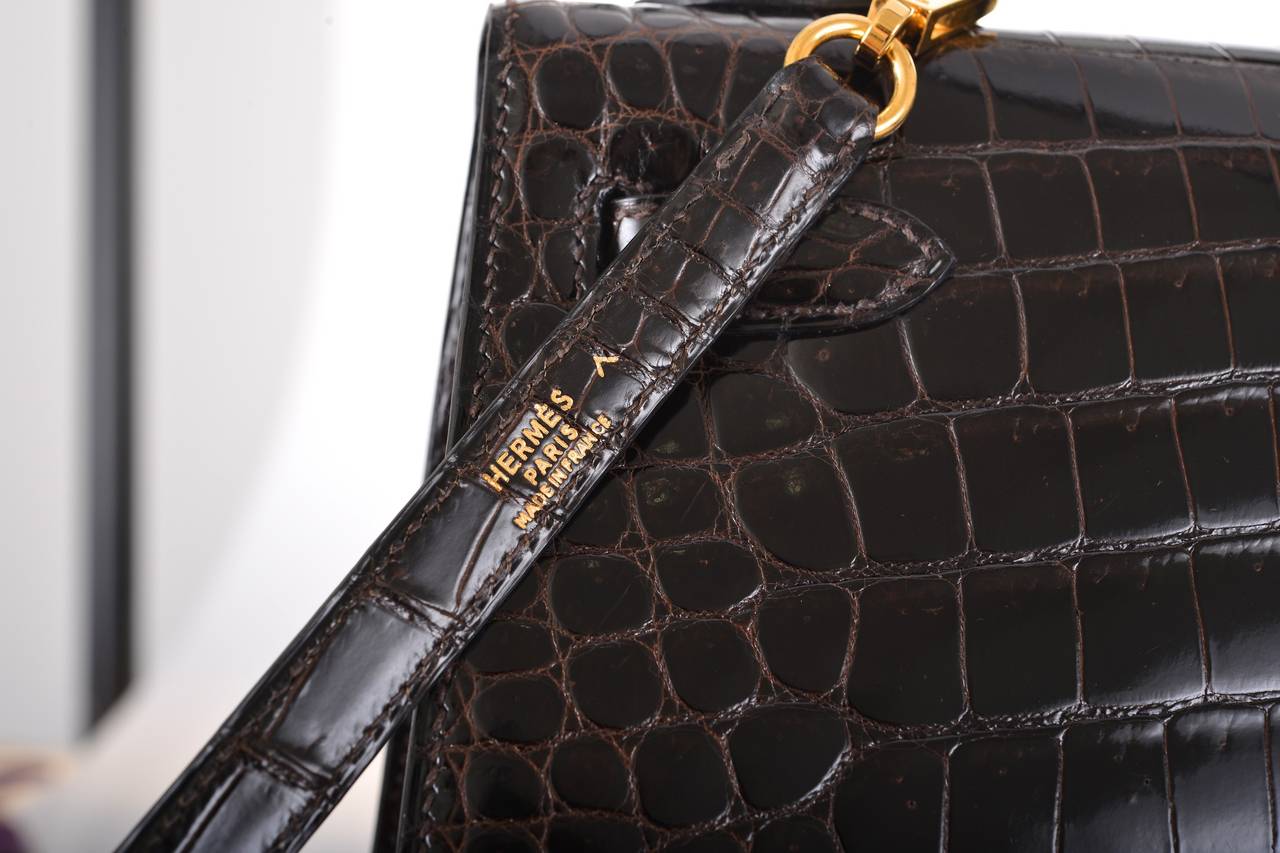 HERMES KELLY BAG 32cm EBENE POROSUS CROCODILE GOLD HARDWARE Janefinds In New Condition In NYC Tri-State/Miami, NY