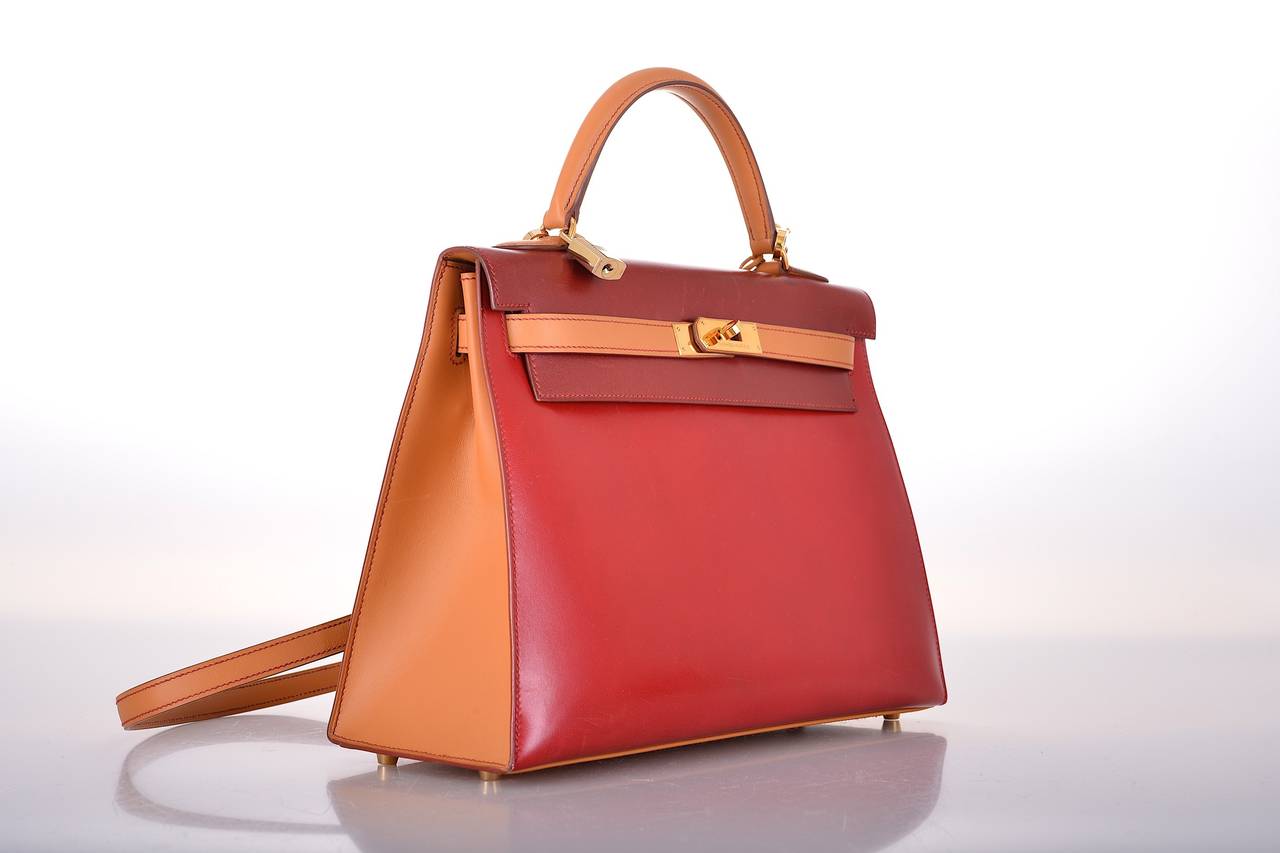 As always, another one of my fab finds! A true collector's piece! SUPER RARE, NO LONGER AVAILABLE!
Hermes 32cm Tri color Kelly. STUNNING COLORS VERMILLION RED, ROUGE H, AND GOLD WITH GOLD HARDWARE. 

JaneFinds baginizer 32cm will be included with
