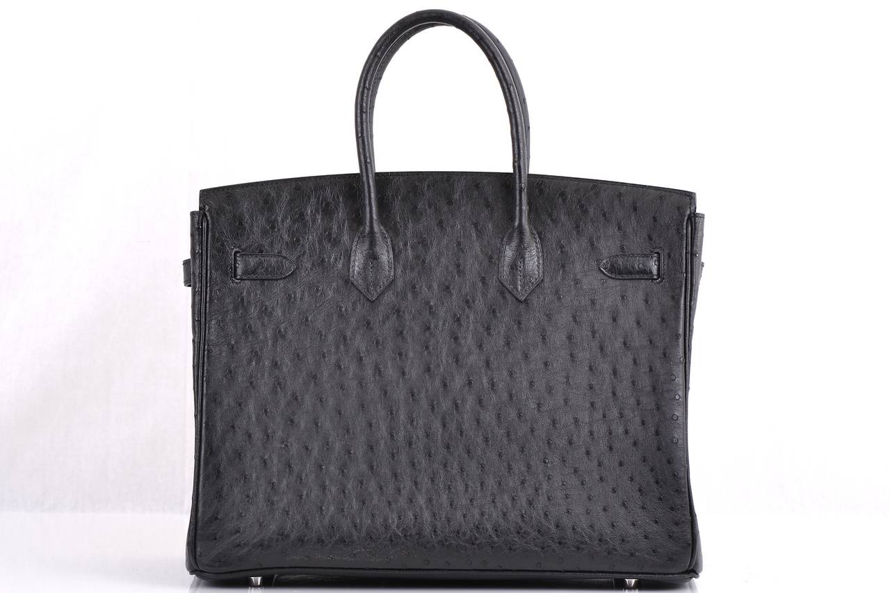 AS ALWAYS ANOTHER ONE OF MY FAB FINDS! HERMES 35CM DISCONTINUED SZ IN IMPOSSIBLE TO GET BLACK COLOR OSTRICH LEATHER.
BIRKIN WITH PALLADIUM HARDWARE!

- THE MOST AMAZING BLACK OSTRICH COLOR WITH PALLADIUM HARDWARE.
-  THE BAG IS IN SUPER PRISTINE