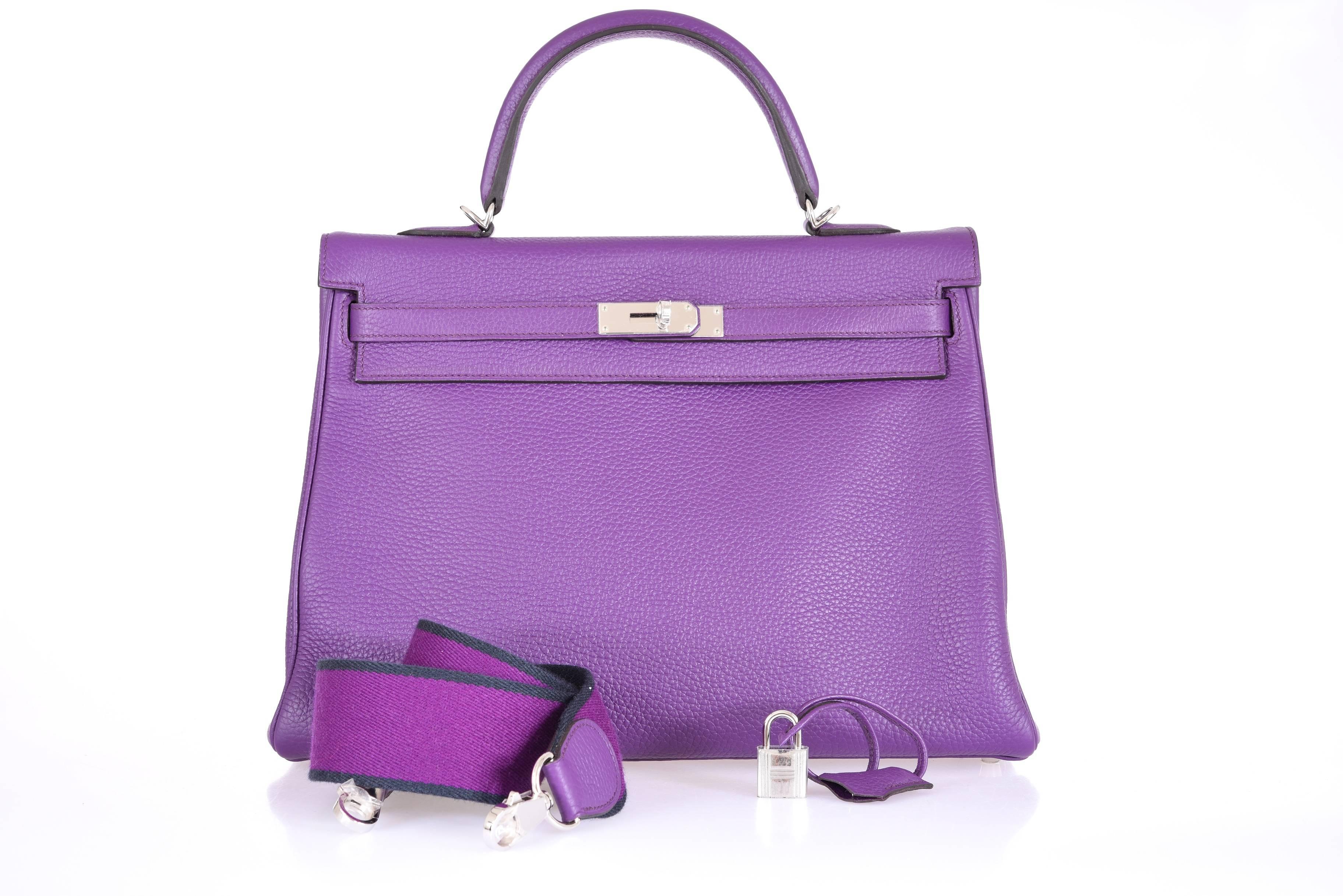 This color is classic stunning!

Gorgeous 35cm new Ultra Violet Clemence leather Kelly with Chevre interior and palladium hardware.

Here is your chance to grab this bag! Fabulous bag!
BAG ONLY. Clothing not included with purchase. 

Comes with the