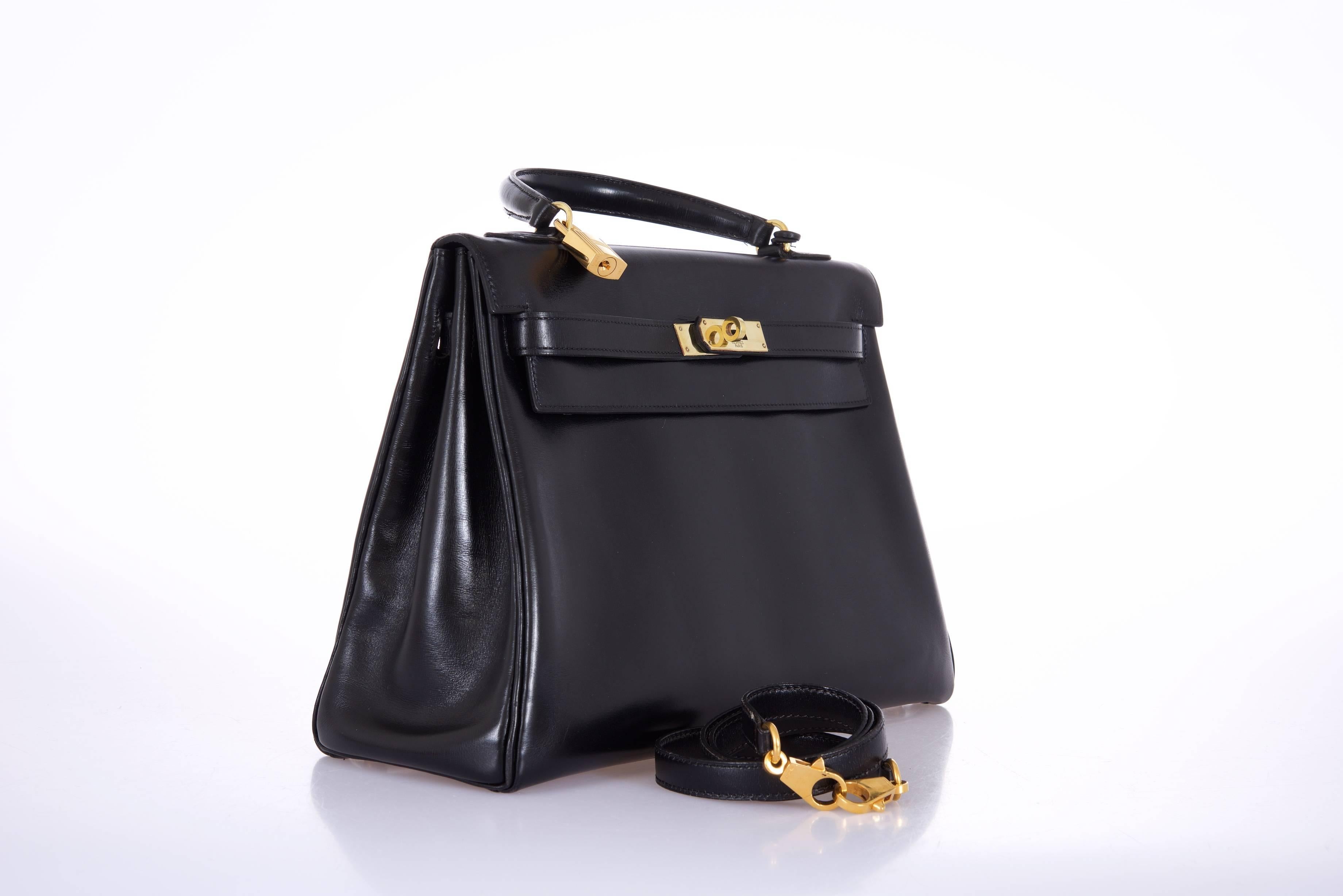 HERMES Kelly Bag 28cm Black Box with Gold hardware Love this bag!

Very good

 

Very Rare Black Box in size 32cm Kelly is constructed of black Box leather which is noted for having a fine grain and a smooth, shiny texture with gold plated hardware.