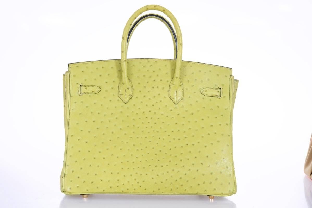 Hermes 35cm Birkin Bag Vert Anis Ostrich interior chevre leather 

Excellent Condition

Hardware: Gold 
Country Of Origin: France
Color: Vert Anis 
Accompanied By: Care Booklet; Dust Bag Plastic Raincoat 

Height (In Inches): 9
Width (In Inches):
