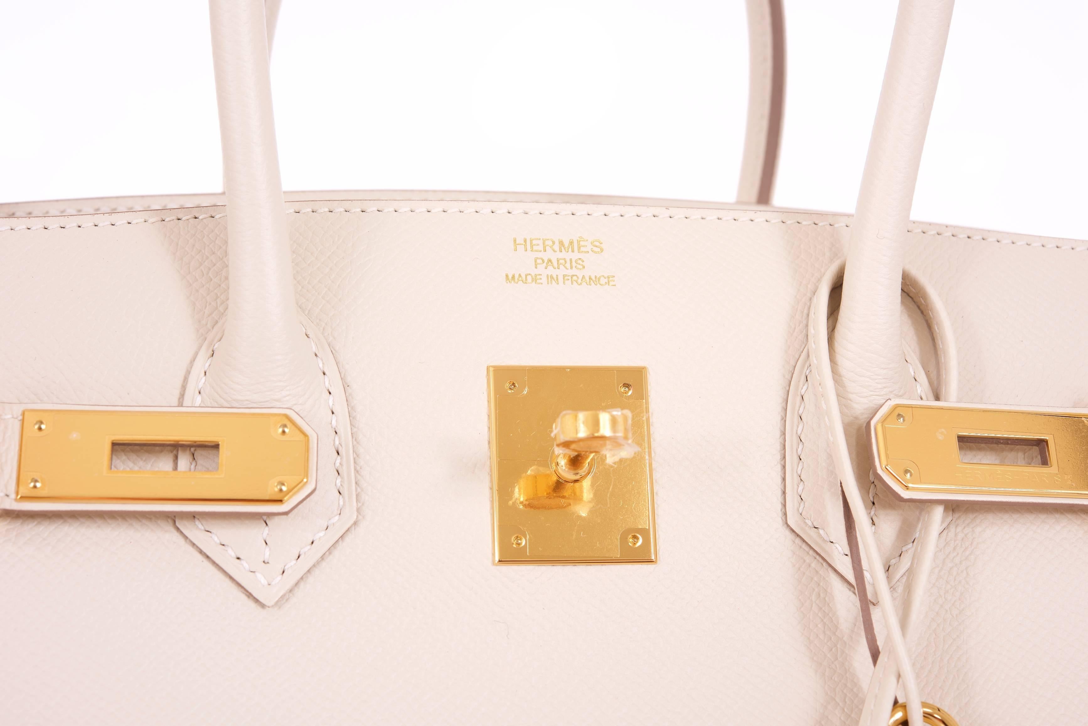 Hermes 35cm Birkin Bag Super Rare Craie Epsom leather Gold hardware stunning color super rare hardware!
Hardware: gold
Country of Origin: France
Color: craie
Accompanied by: Care Booklet; Dust Bag Plastic Raincoat box
Closure: Clasp
Height (in